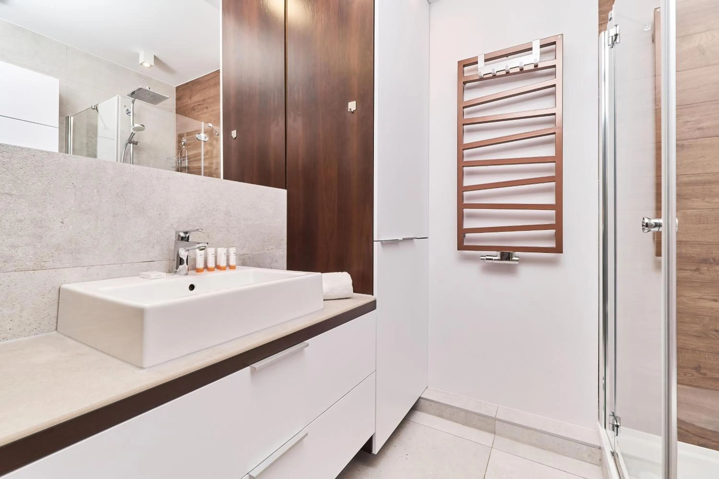 Bathroom in Nowa Tęczowa Apartments Promenada Staromiejska by Noclegi Renters