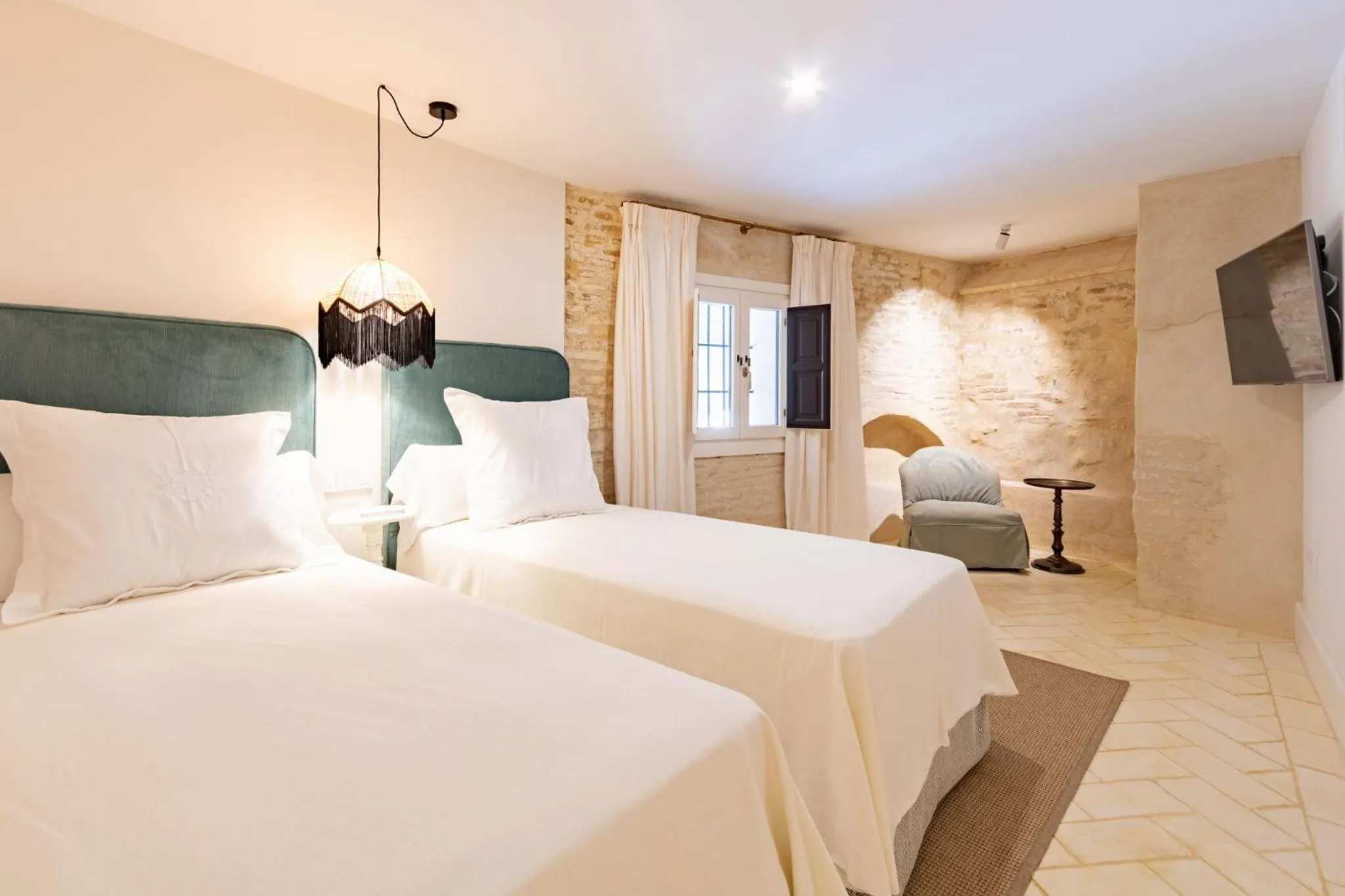 Photo of the whole room, Bed in Casa de la Moneda Residences Sevilla