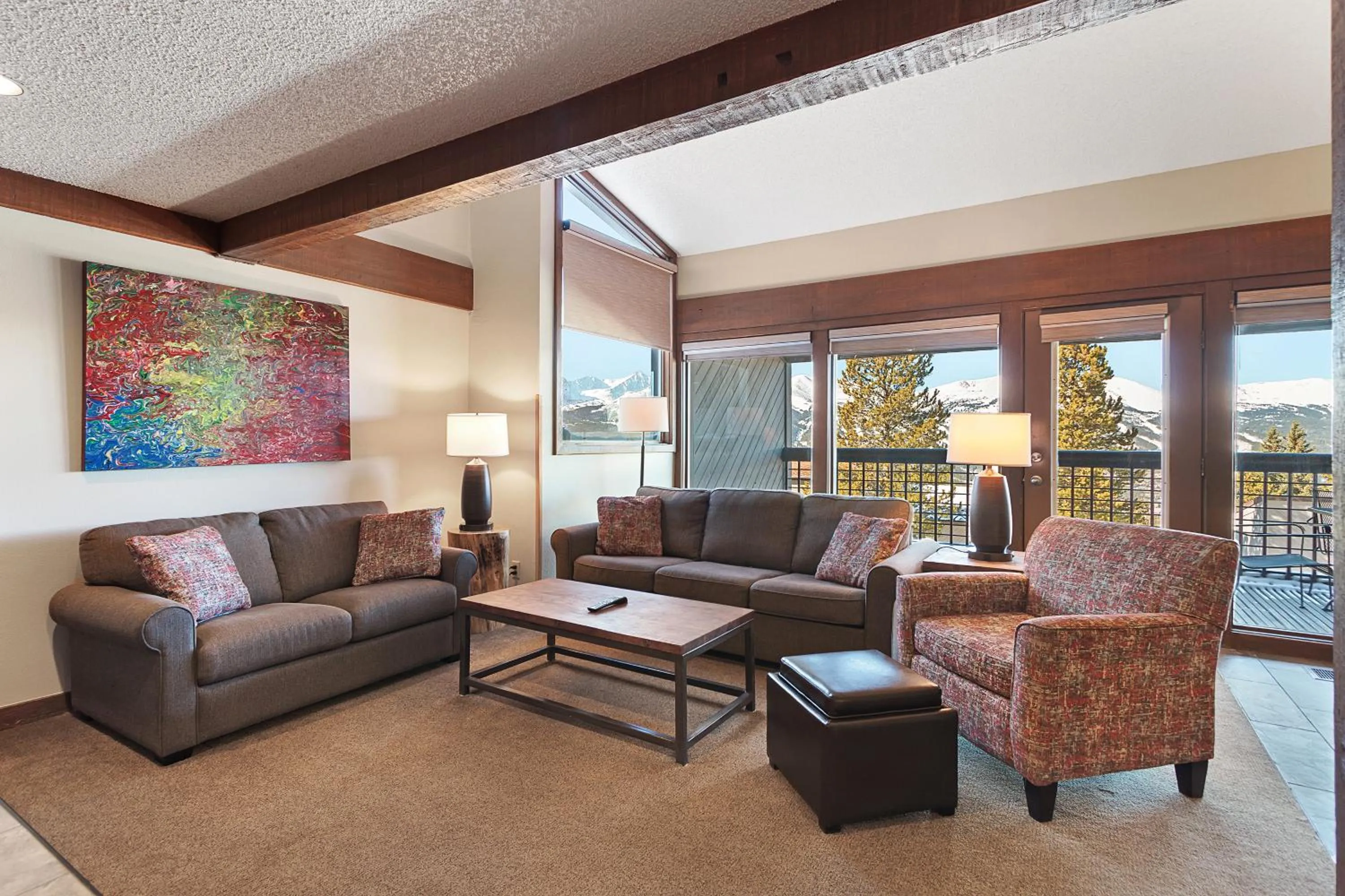 Living room in Gold Point Resort Breckenridge by Vacatia
