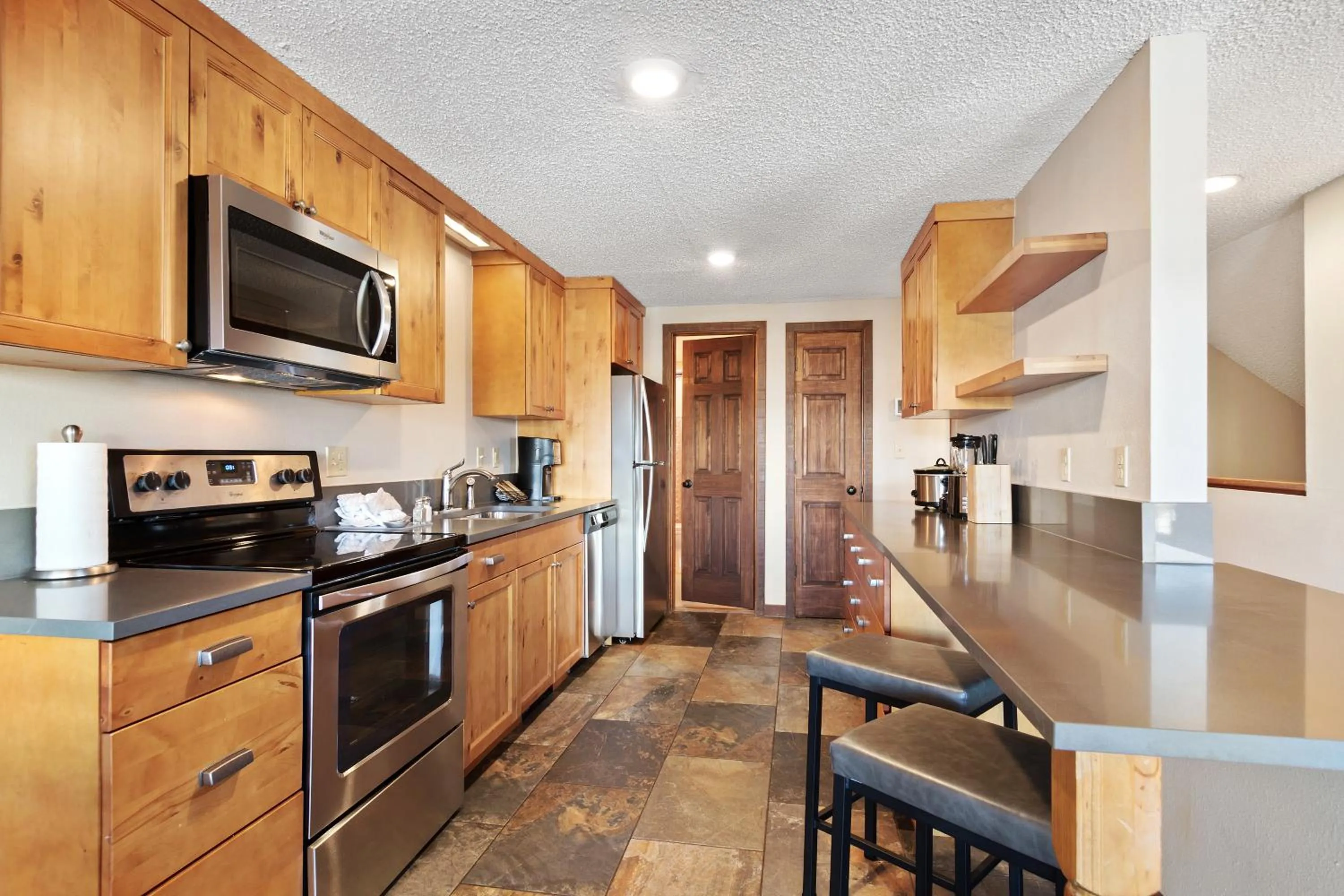 Kitchen or kitchenette in Gold Point Resort Breckenridge by Vacatia