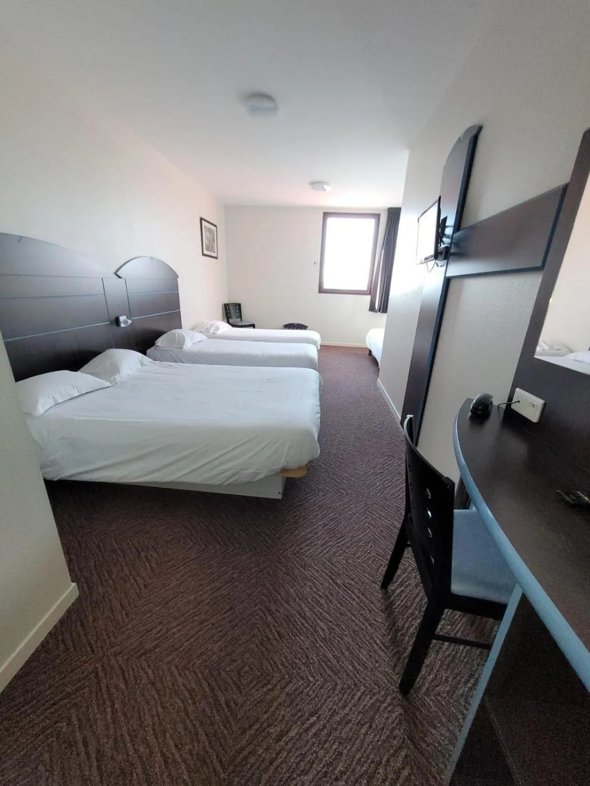 Bed in BRAUCOL Hotel