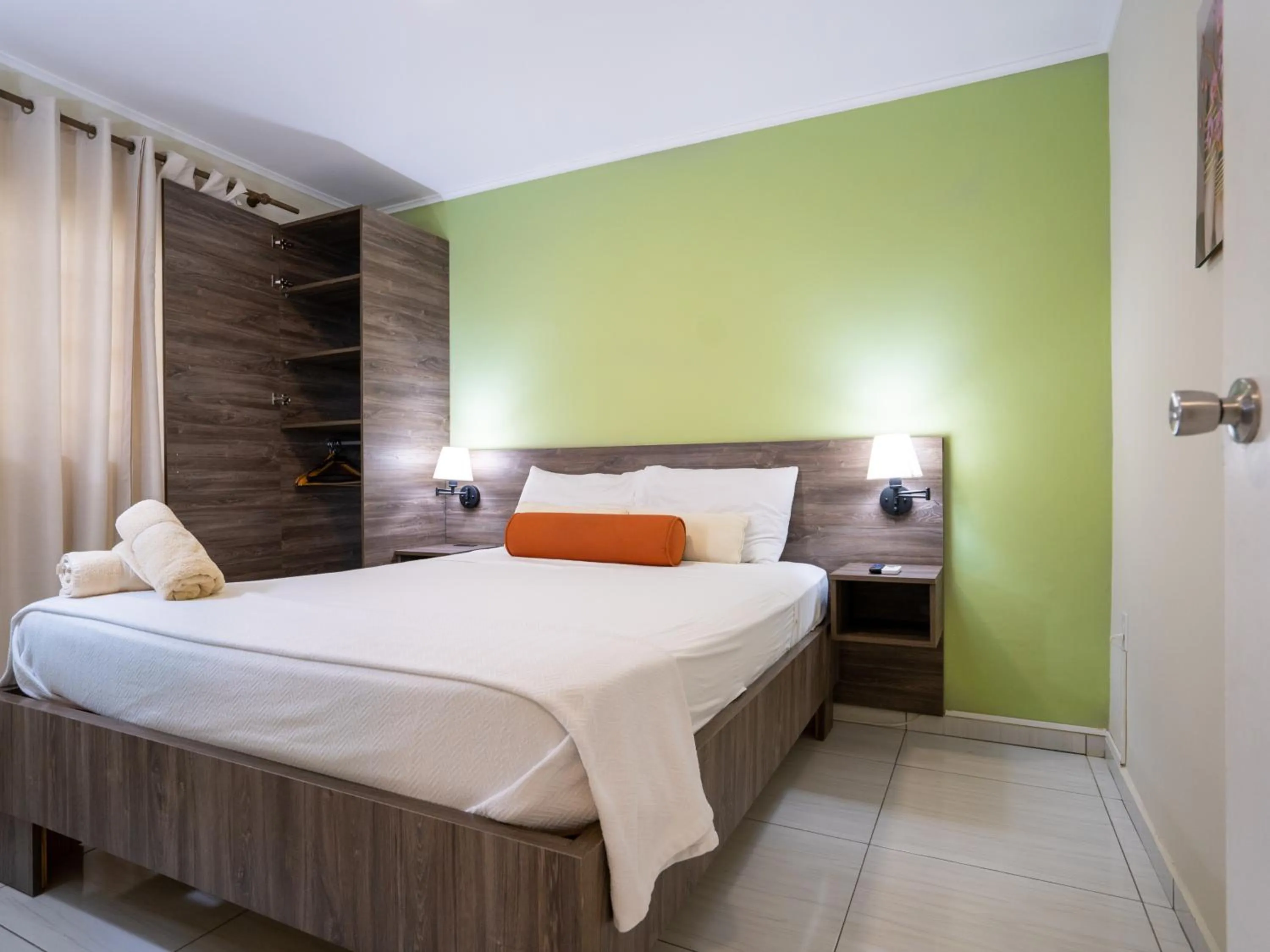 Bed in Delynne Boutique Hotel