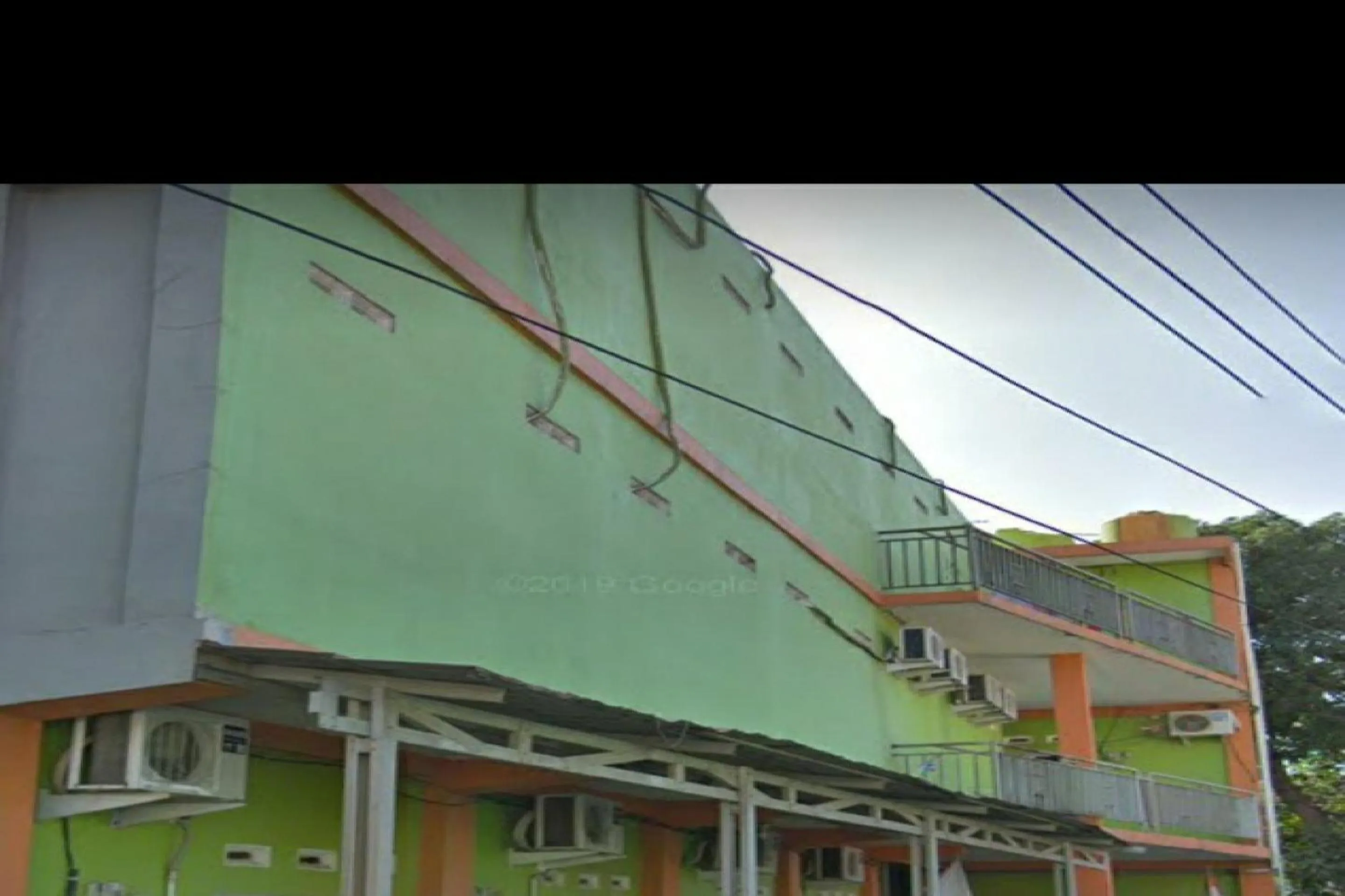 Facade/entrance in OYO 90706 Kost Alam Jaya Syariah