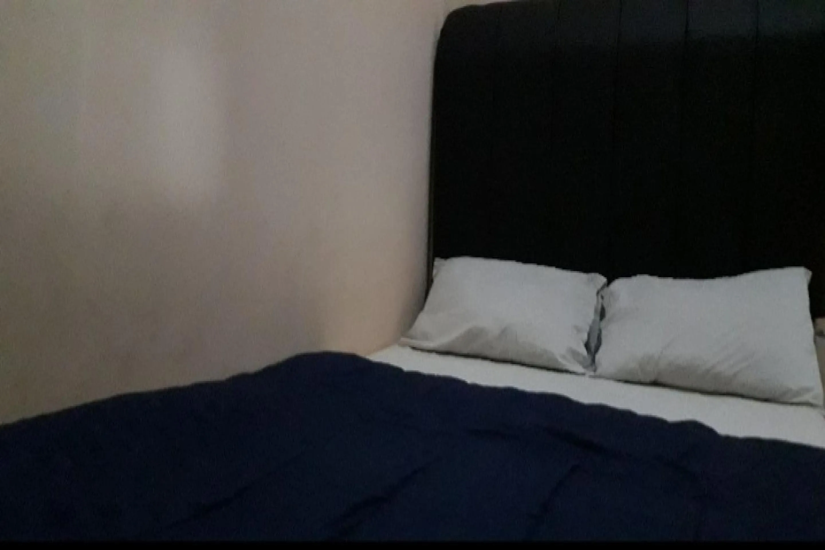 Bedroom in OYO 90706 Kost Alam Jaya Syariah