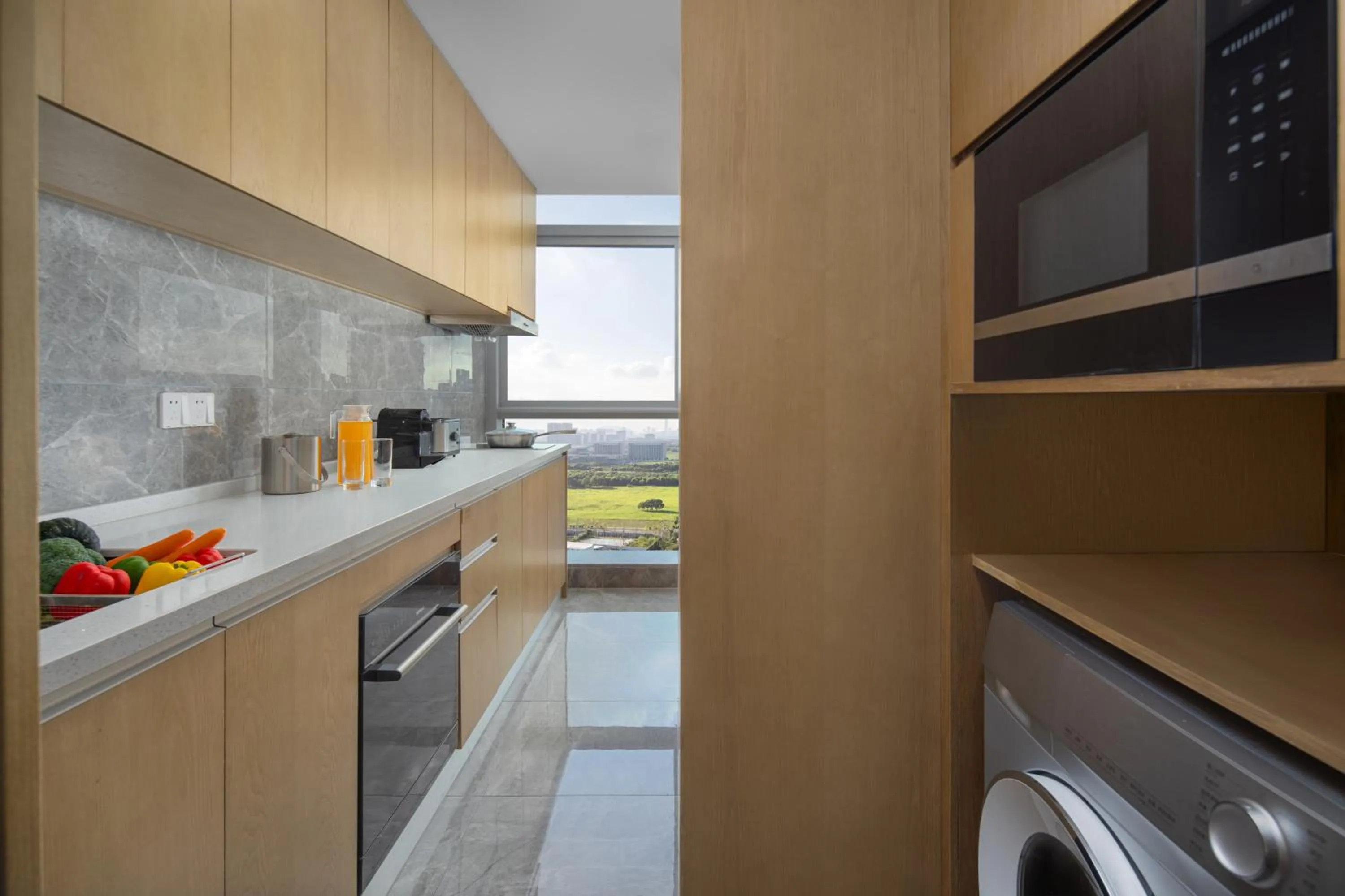 kitchen in Ascott New District Wuxi