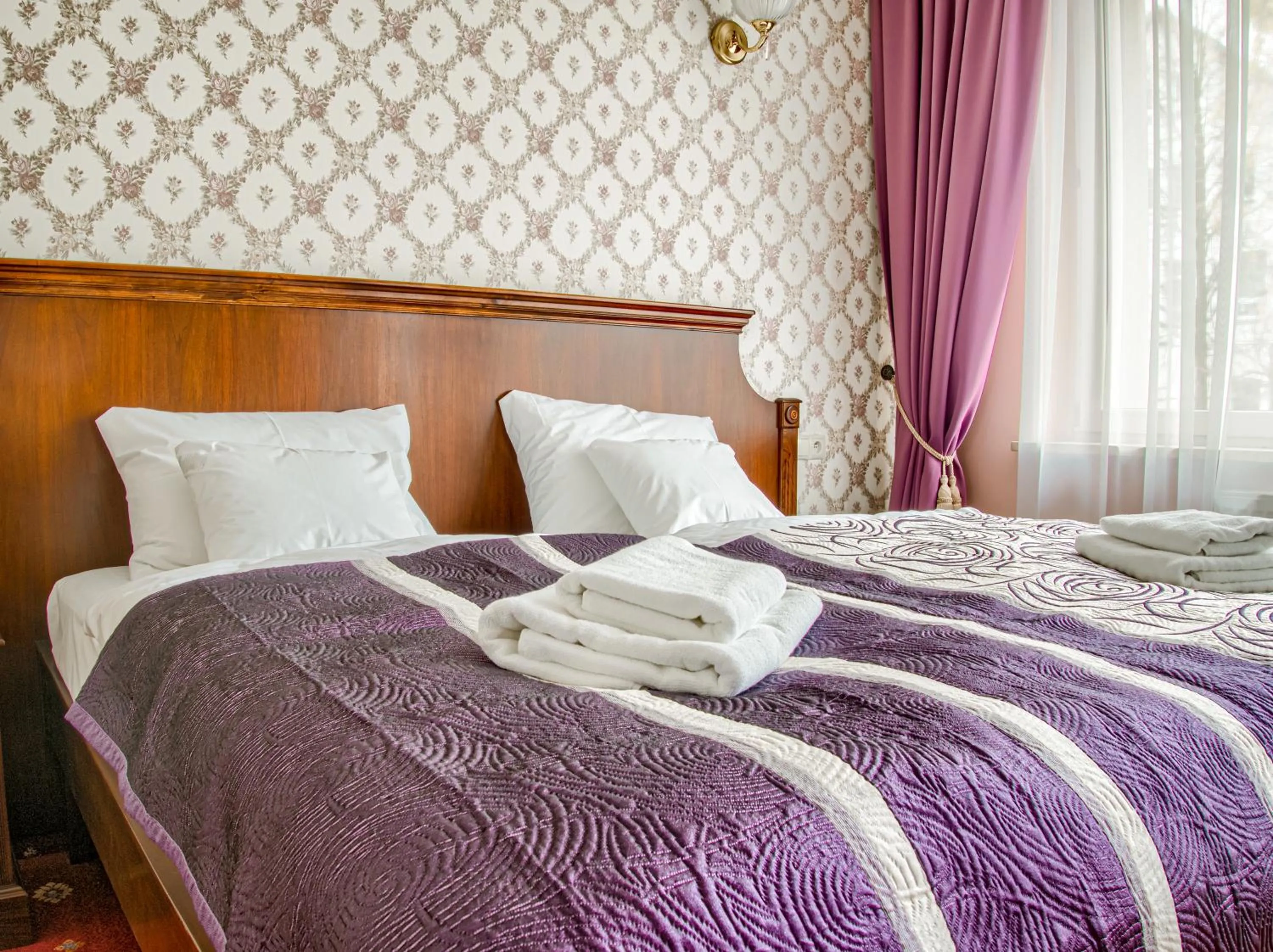 Bed in ApartHotel Hubertus