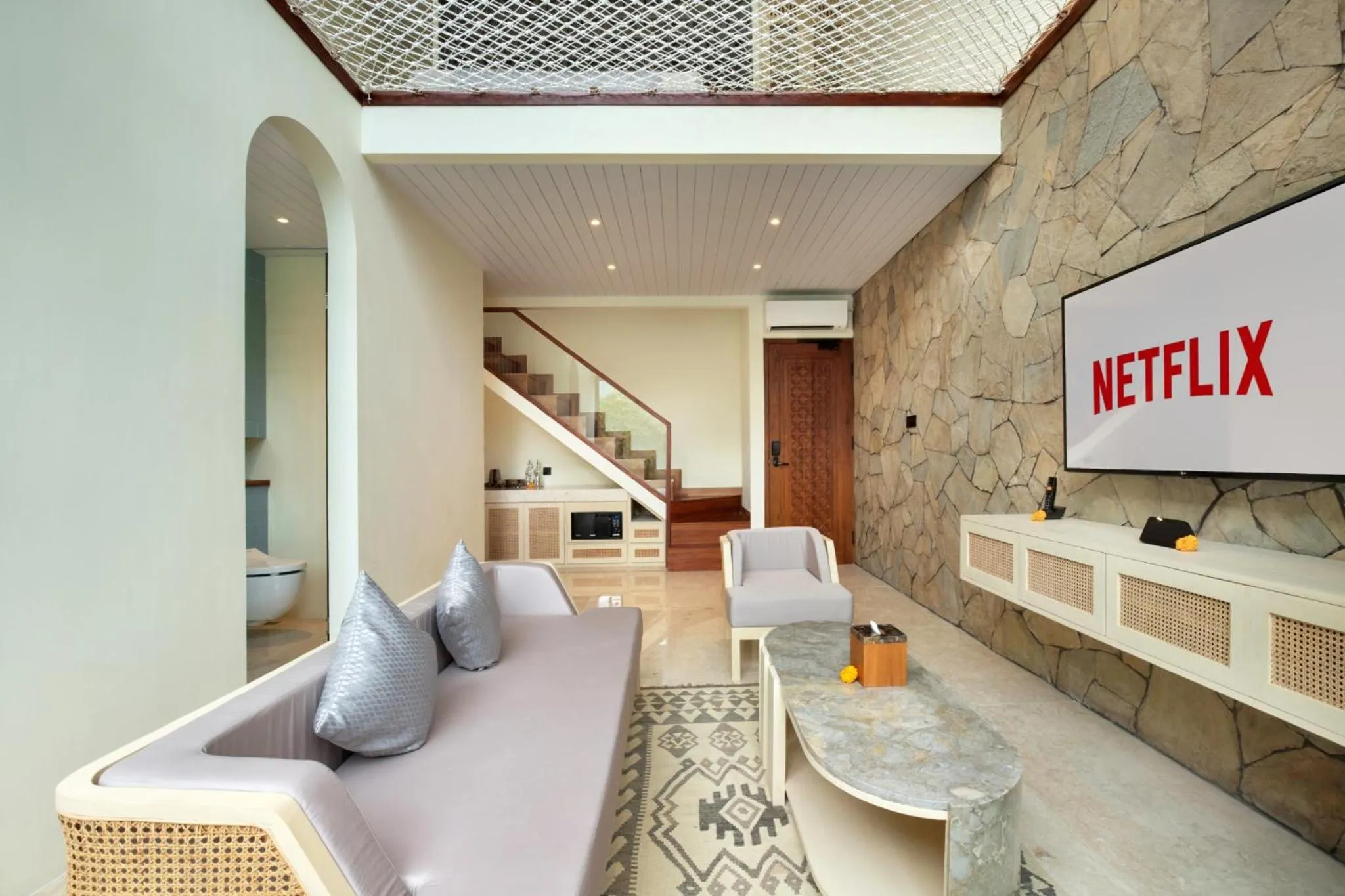 Living room in Astera Resort & Spa Canggu by Ini Vie Hospitality
