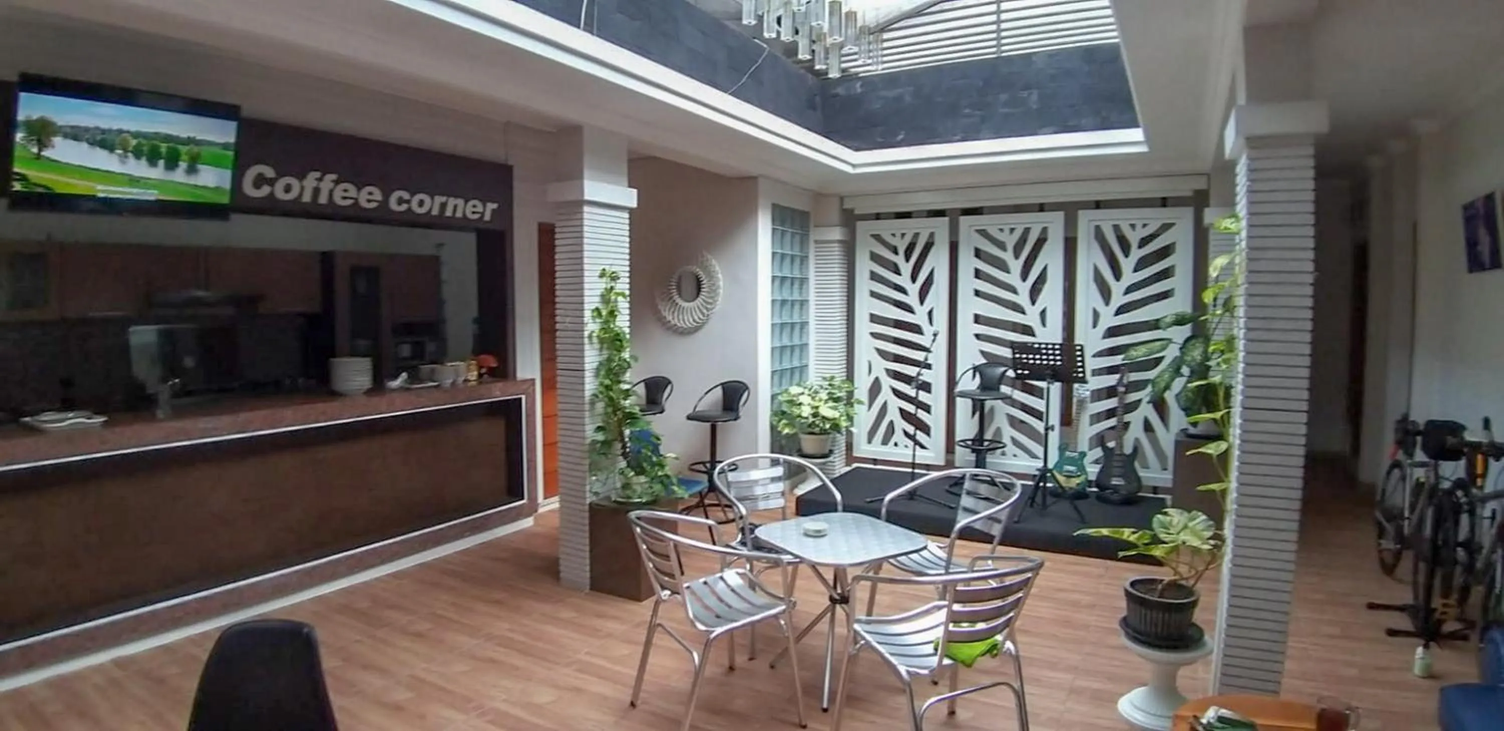 Seating area in Maita Homestay Ringroad Utara Mitra RedDoorz