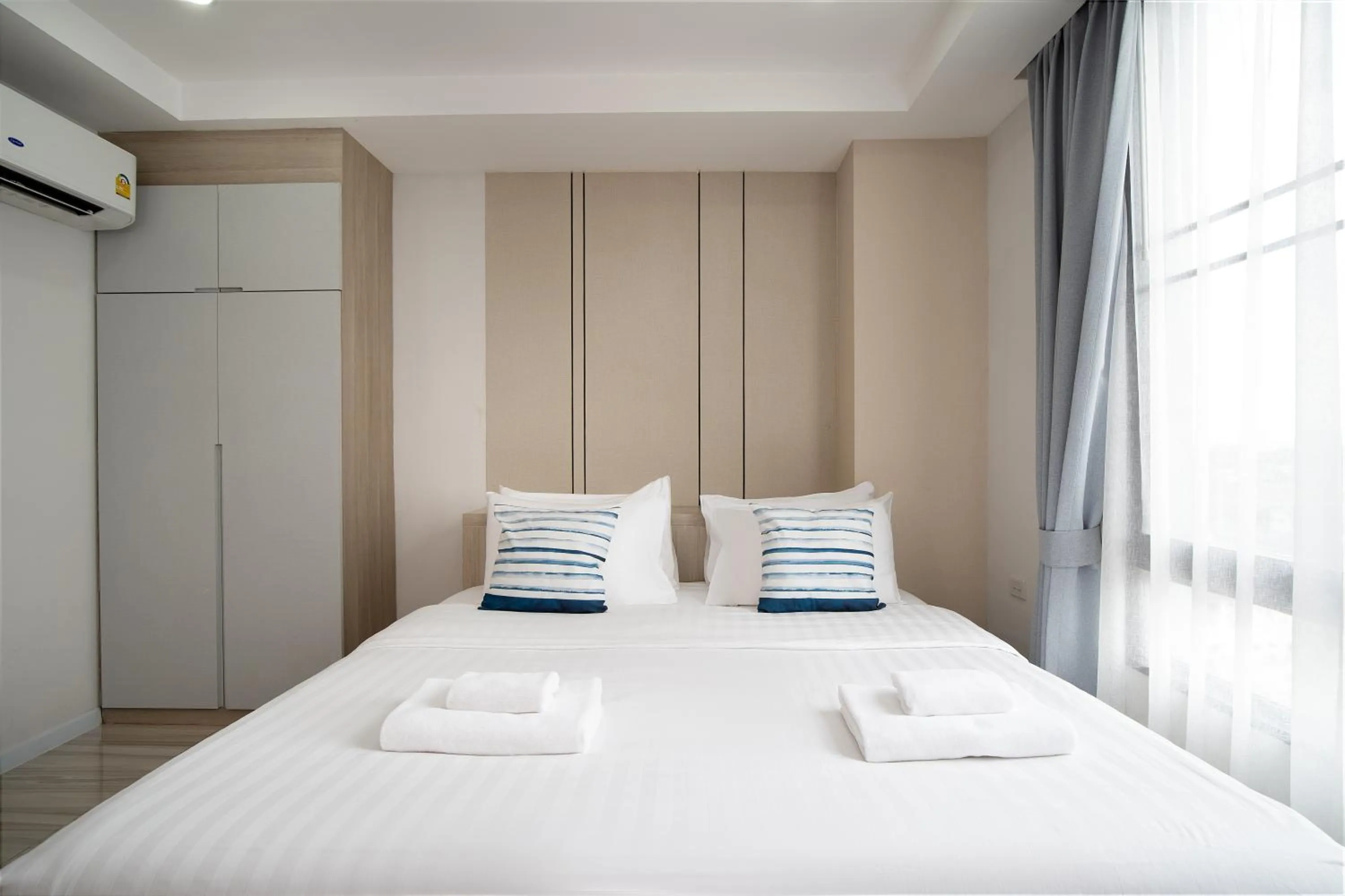 Bed in The Riski Hotel at Bangphlat Station SHA