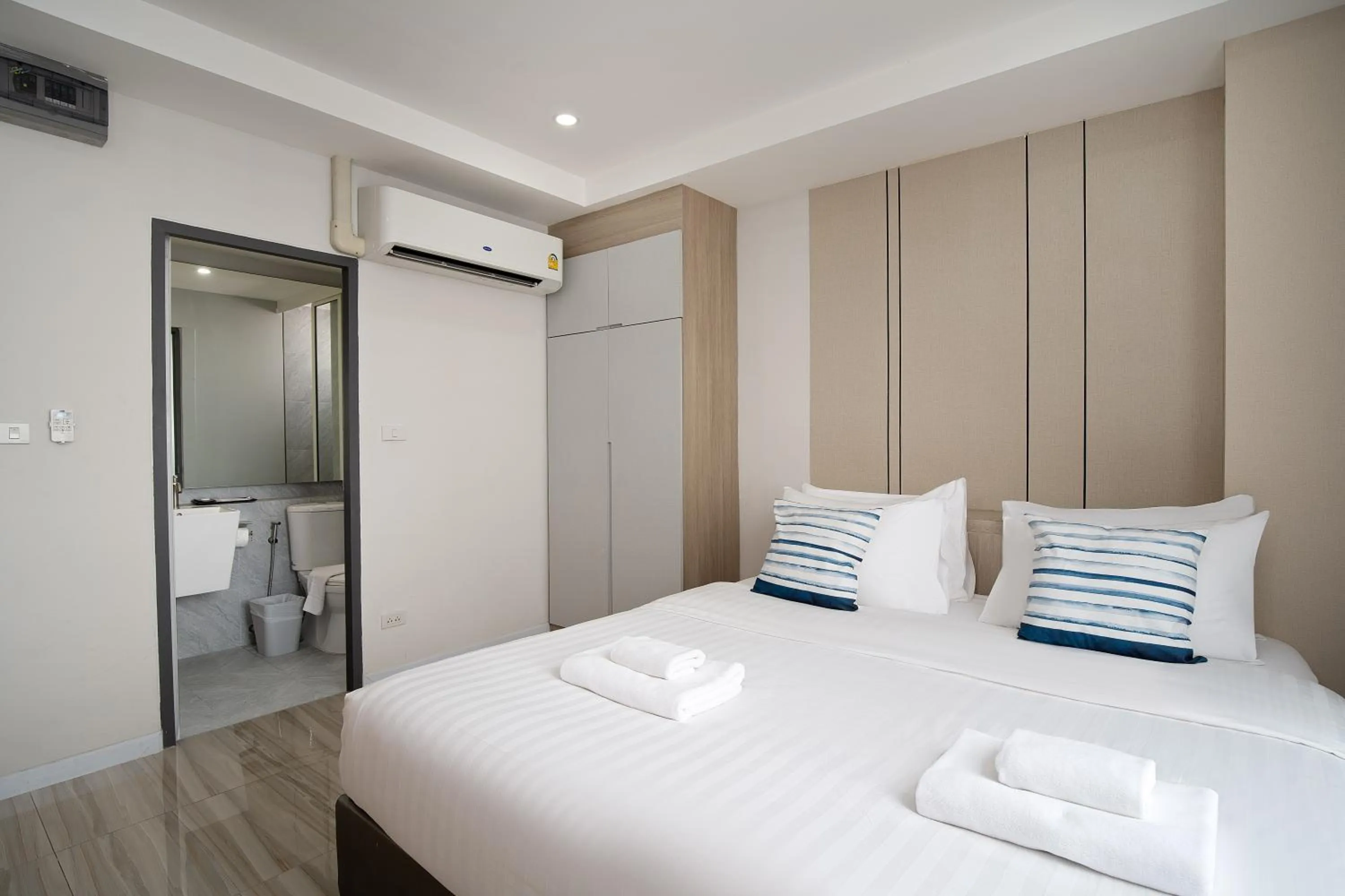 Bed in The Riski Hotel at Bangphlat Station SHA