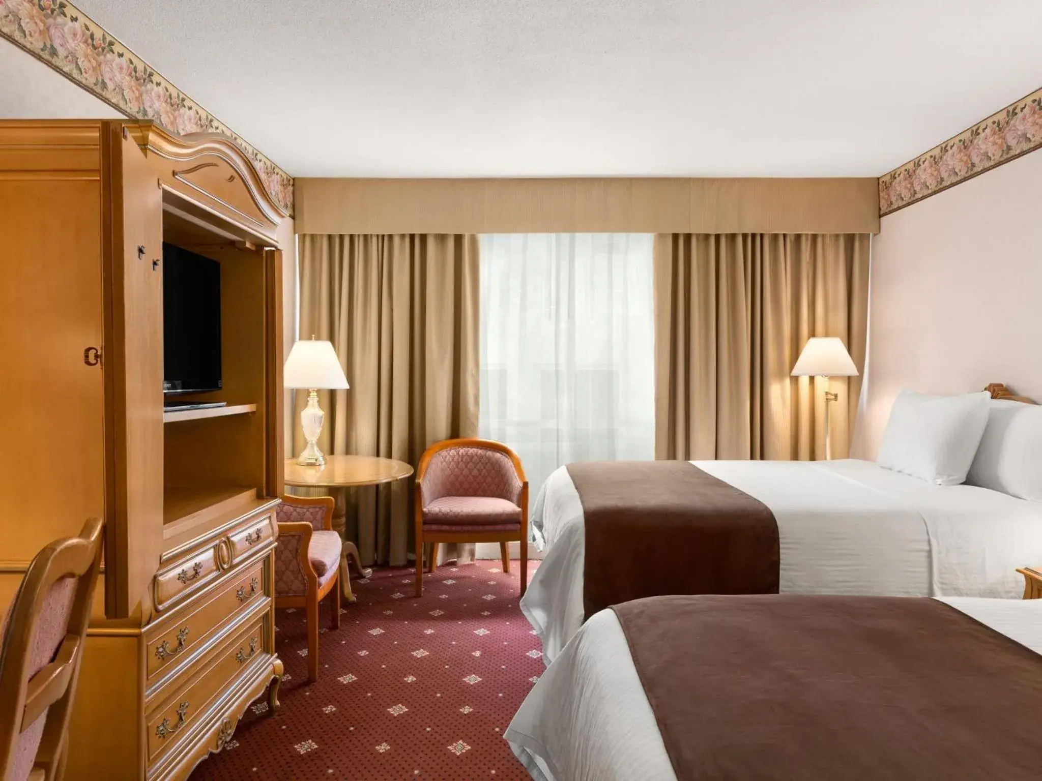 Queen Room with Two Queen Beds - City View in Travelodge by Wyndham Niagara Falls Fallsview Queen Room with Two Queen Beds - City View in Travelodge by Wyndham Niagara Falls Fallsview