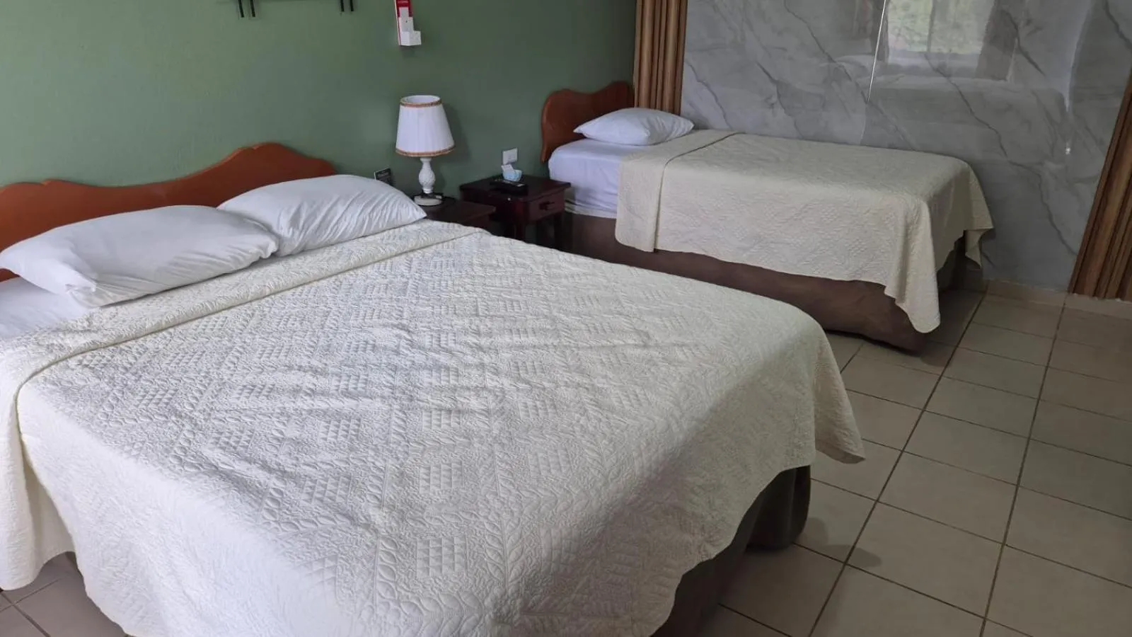 Bed in Hotel Divisamar by LHR