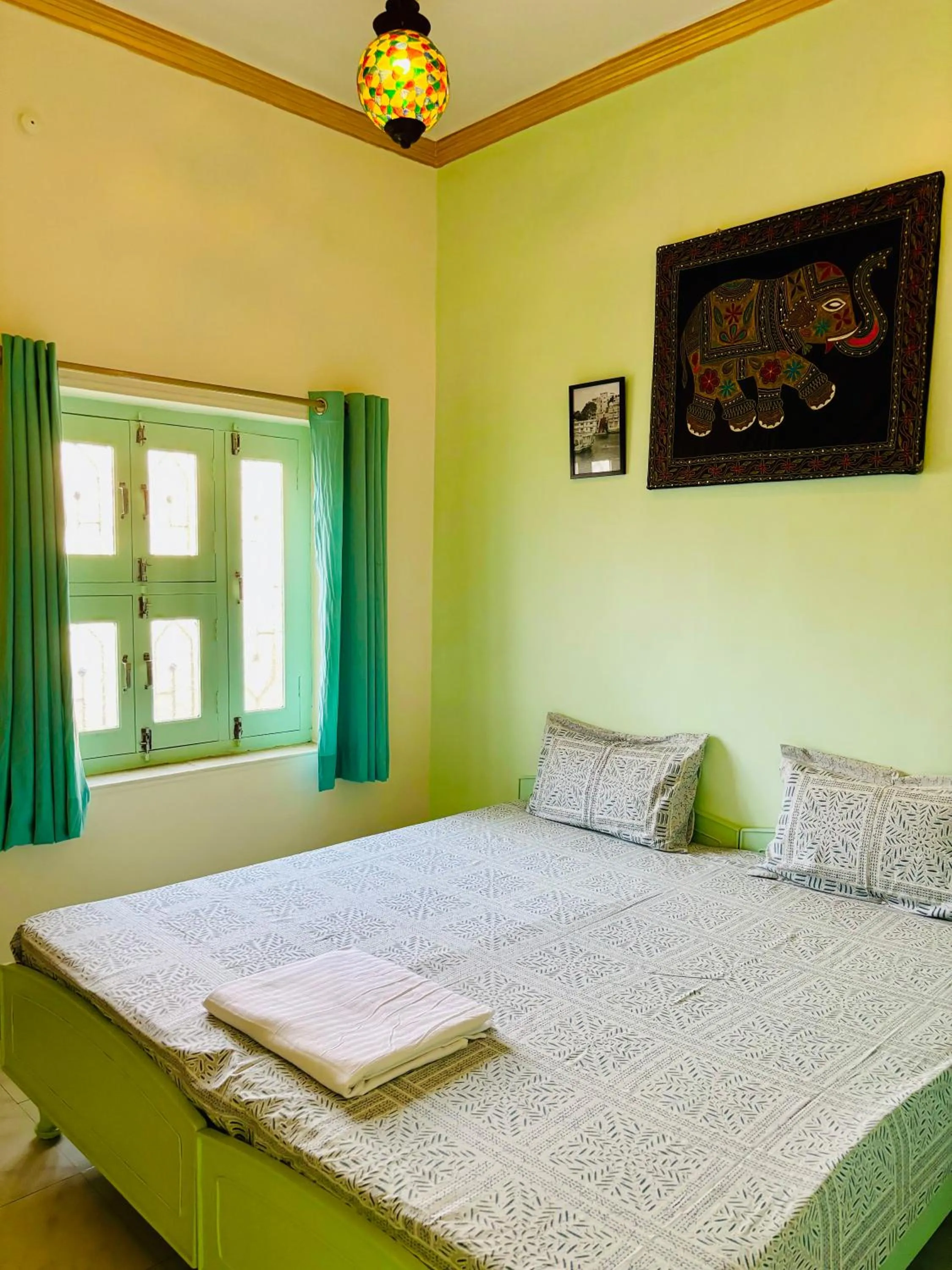 Bed in Hotel tulsi palace