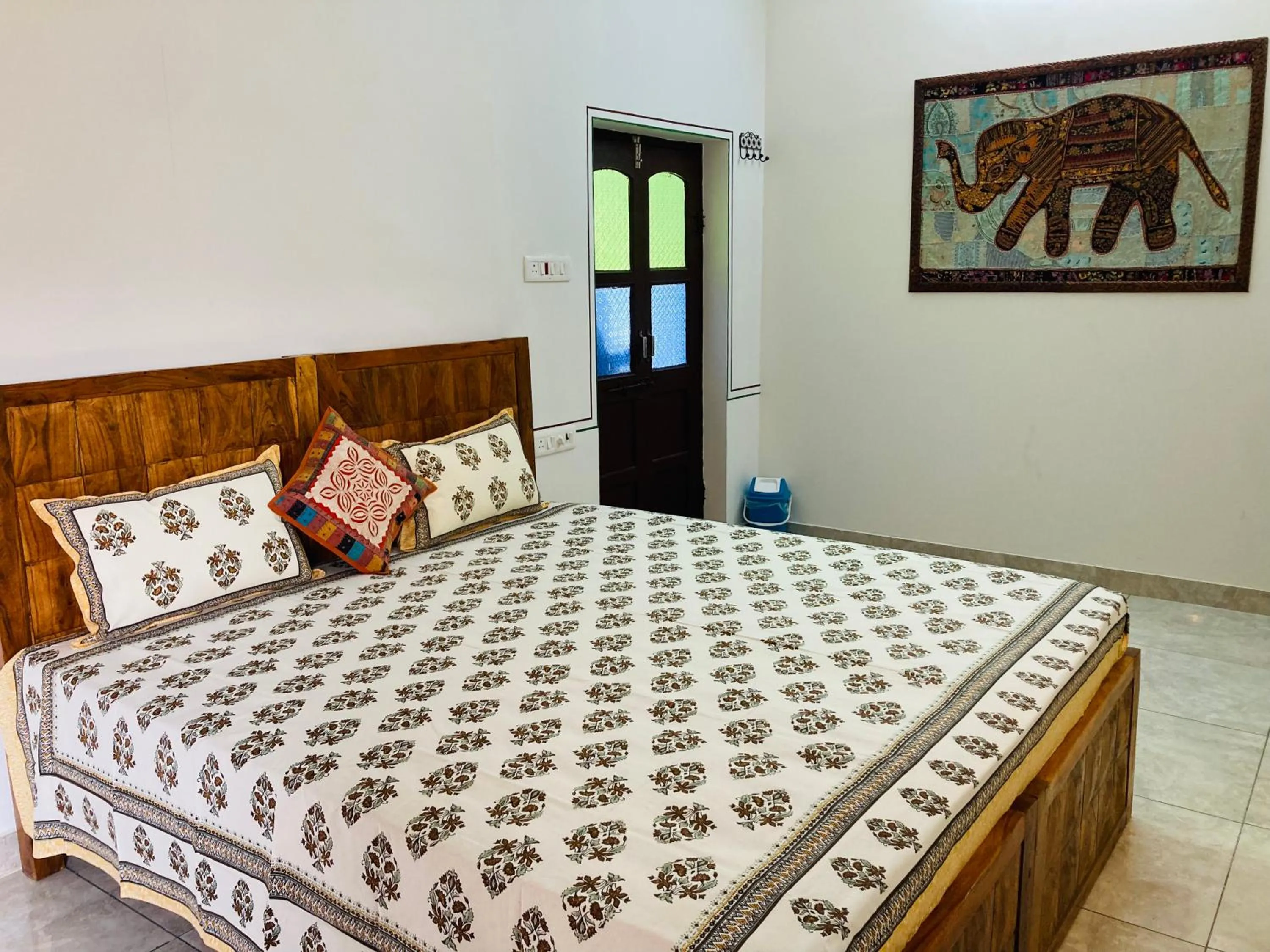 Bed in Hotel tulsi palace