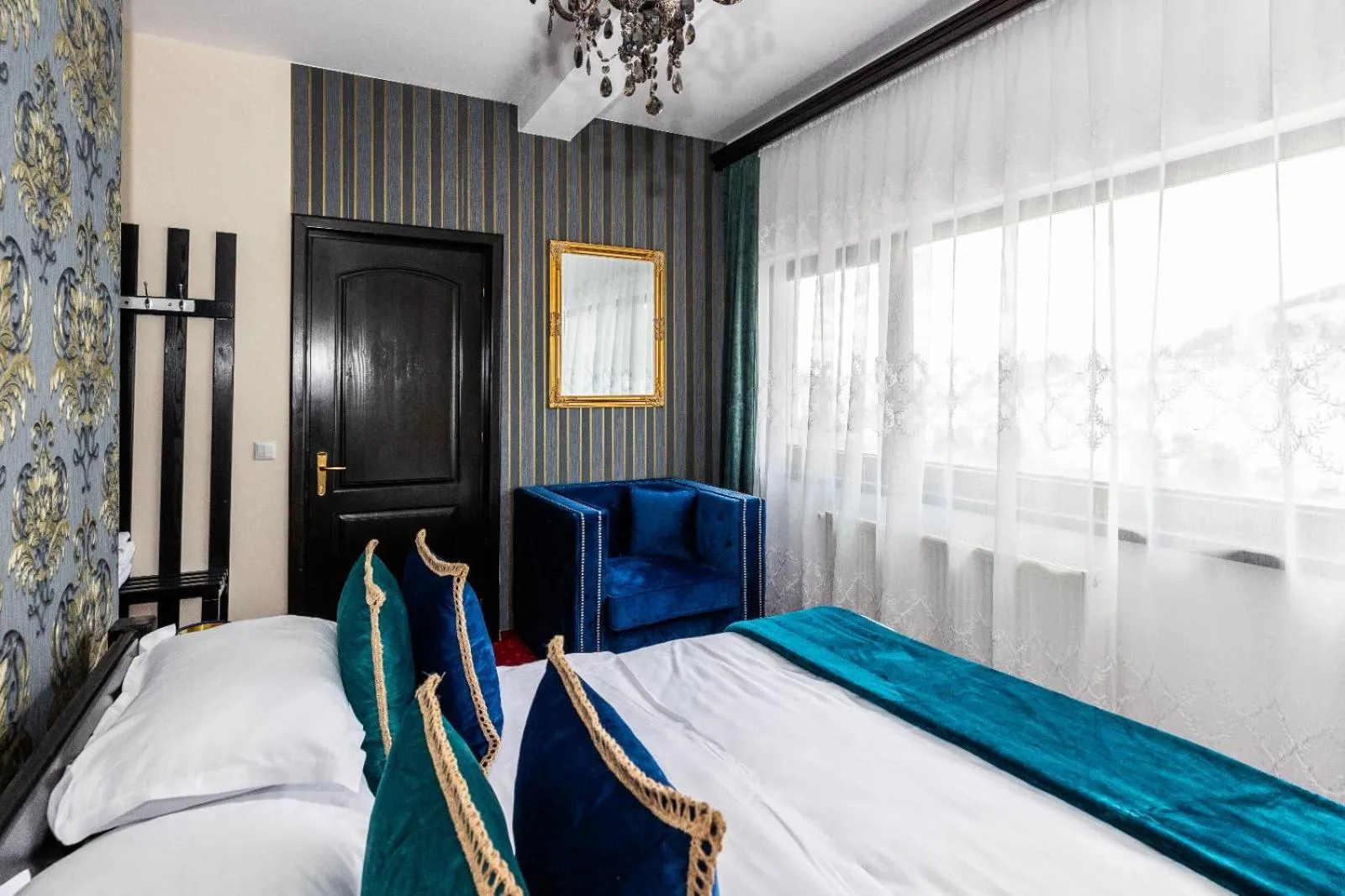 Photo of the whole room, Bed in VILA LUCA-Hotel