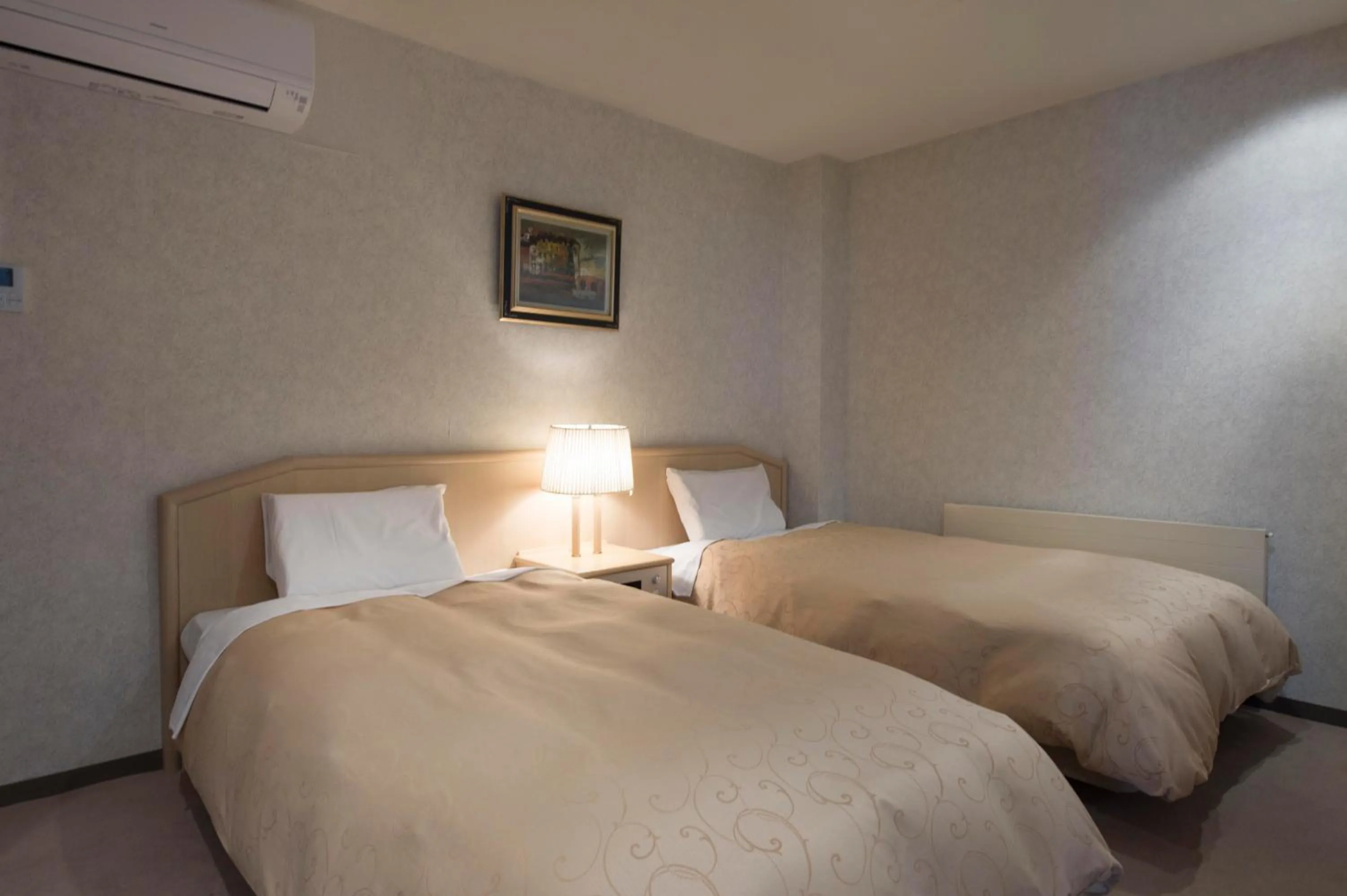 Bed in Izumigo AMBIENT Azumino Hotel