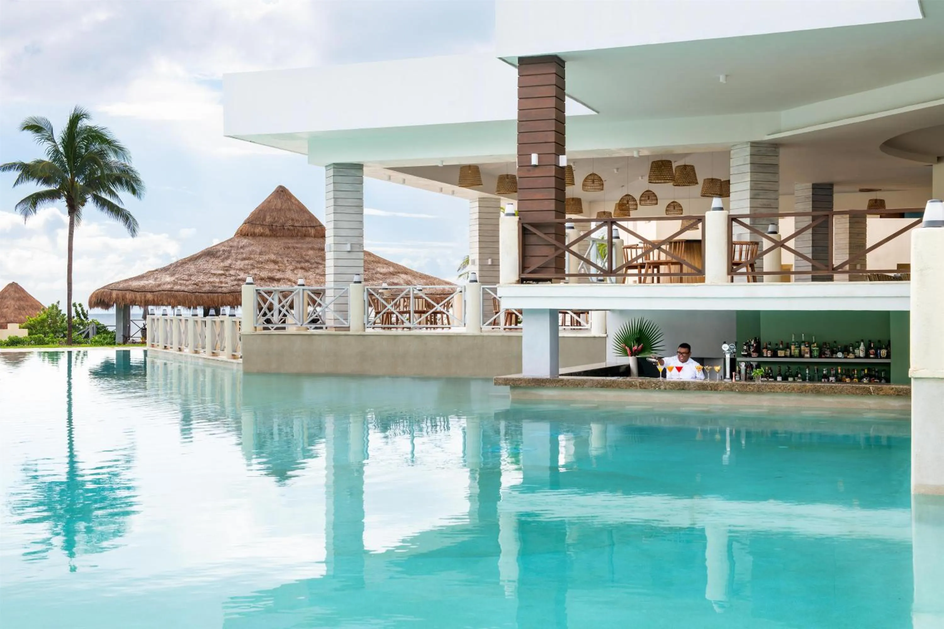 Swimming pool in Dreams Puerto Morelos Resort & Spa - All Inclusive