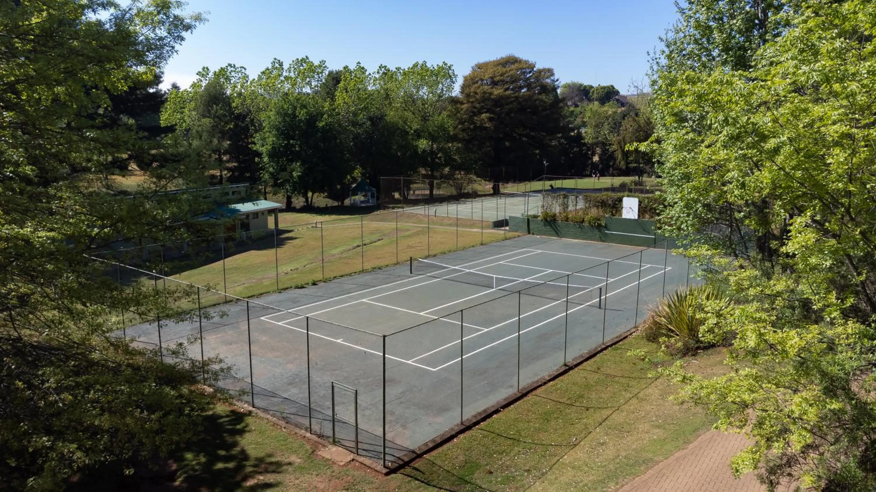 Tennis court in Gooderson Monks Cowl Golf Resort