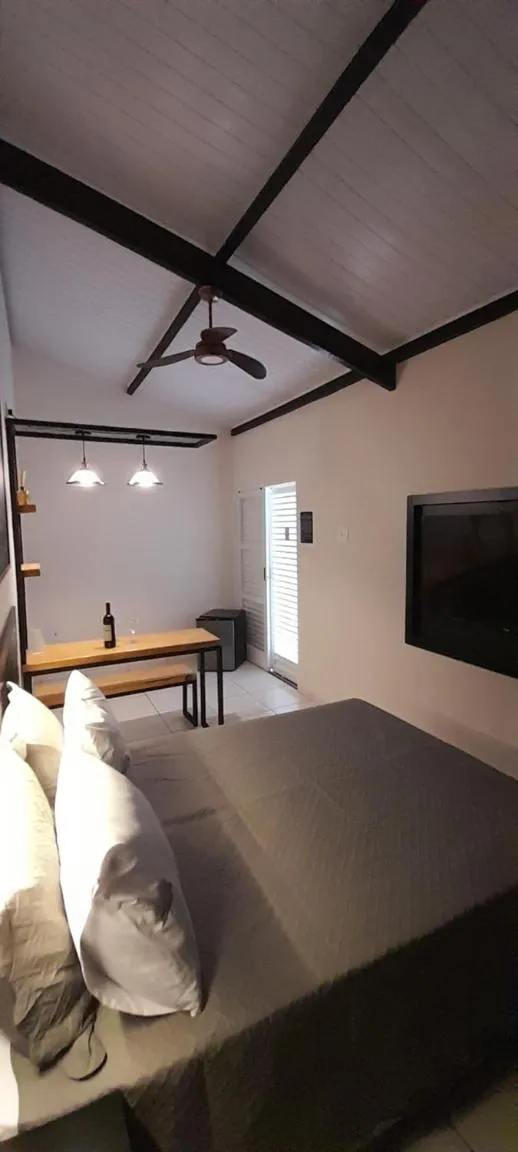 Bed in Pousada Encantos de Socorro