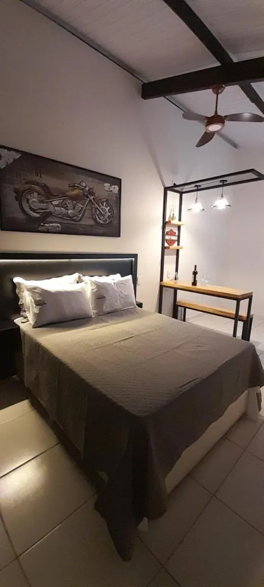 Bed in Pousada Encantos de Socorro