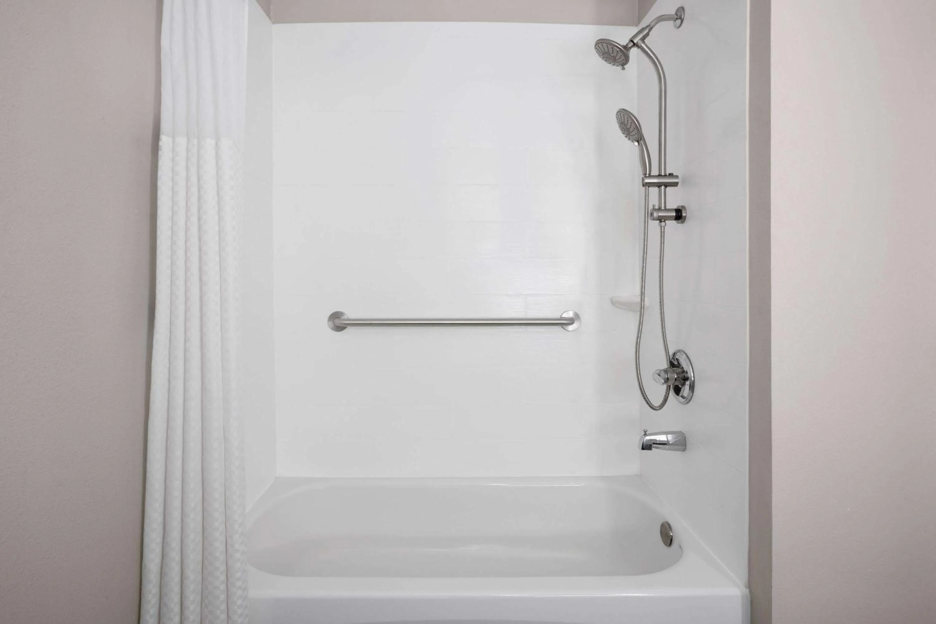 Bathroom in Microtel Inn by Wyndham Raleigh-Durham Airport