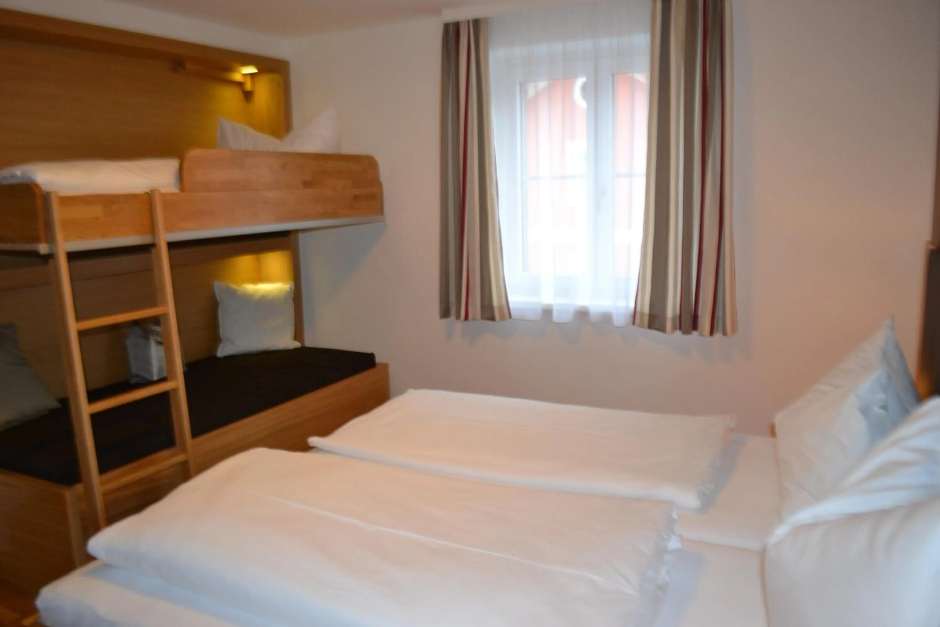 Bed in Hotel Gasthof Tirolerwirt