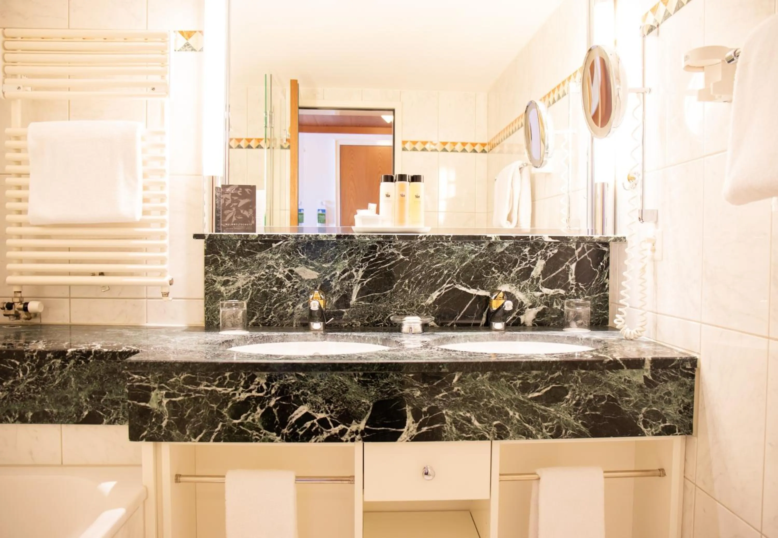 Bathroom in Arosa Kulm Hotel & Alpin Spa