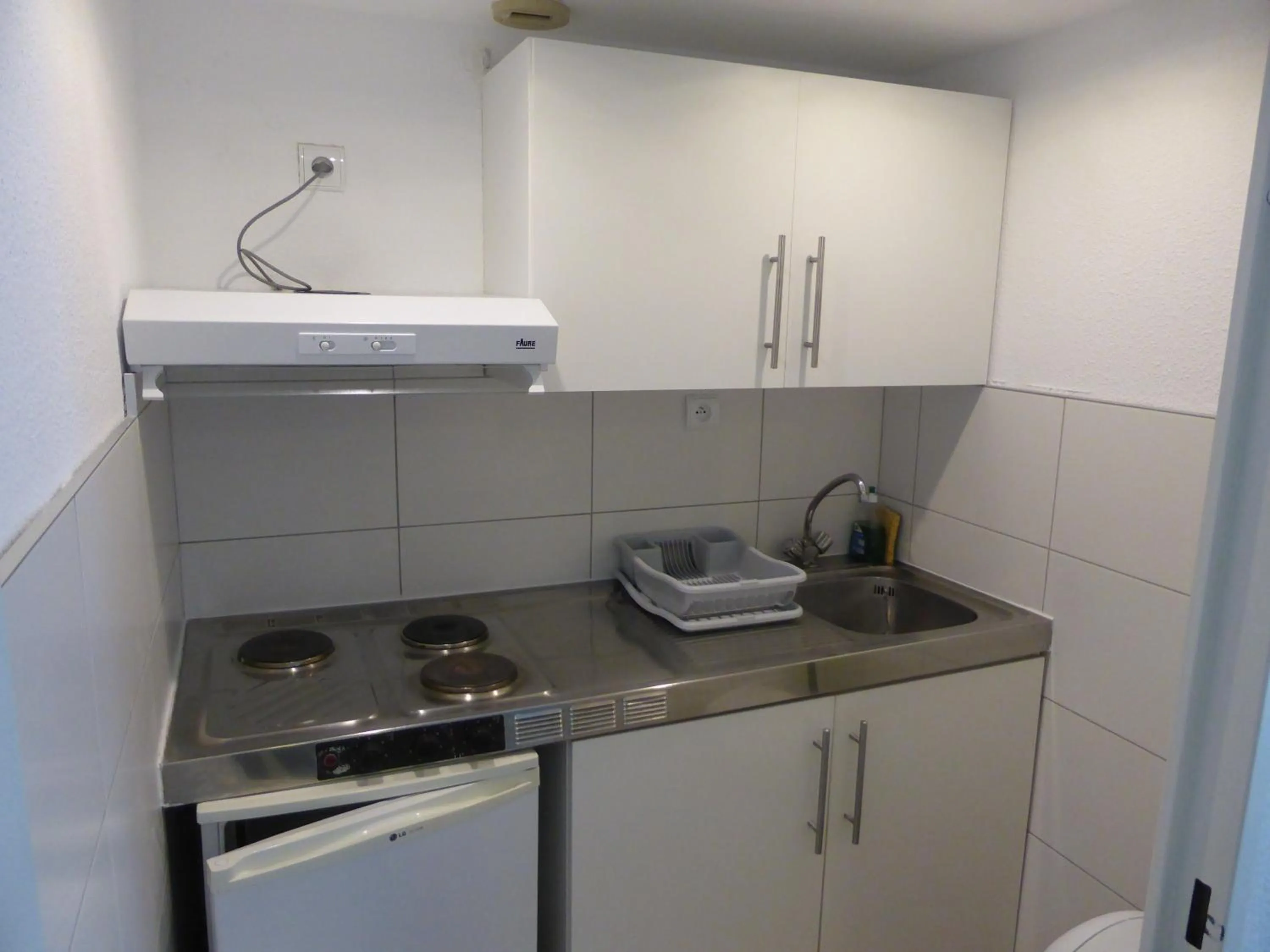 Kitchen or kitchenette in Hotel & Restaurant Heliotel