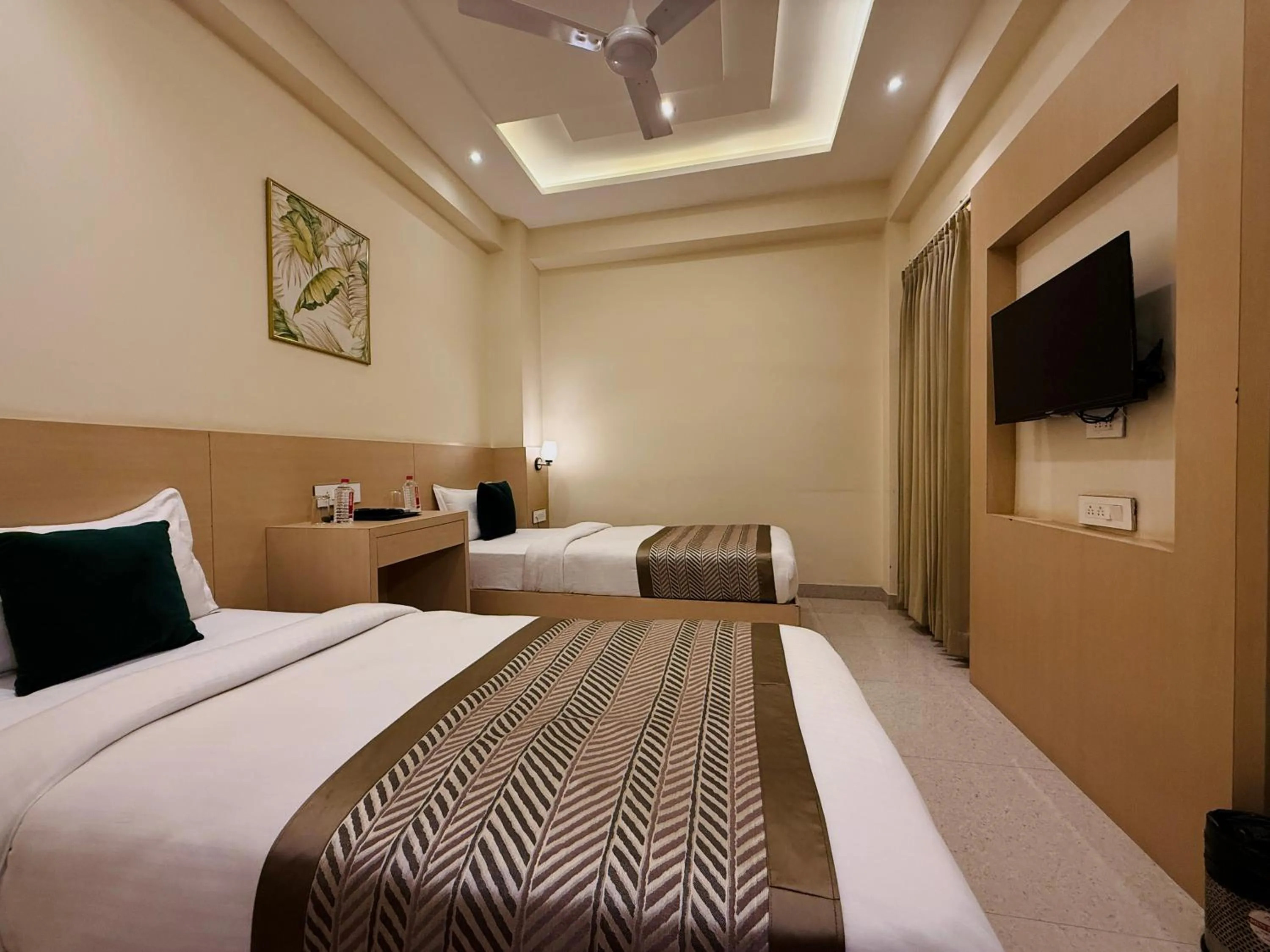 TV and multimedia, Bed in RION - A Boutique Hotel