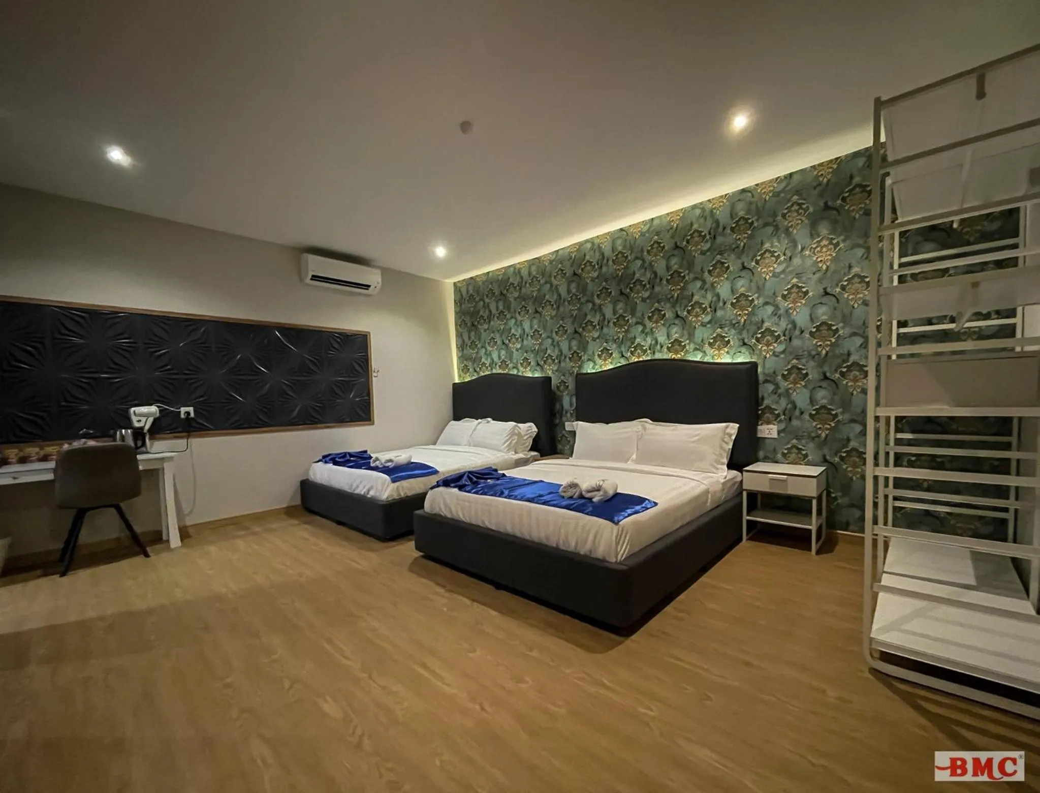 Photo of the whole room, Bed in BMC Hotel