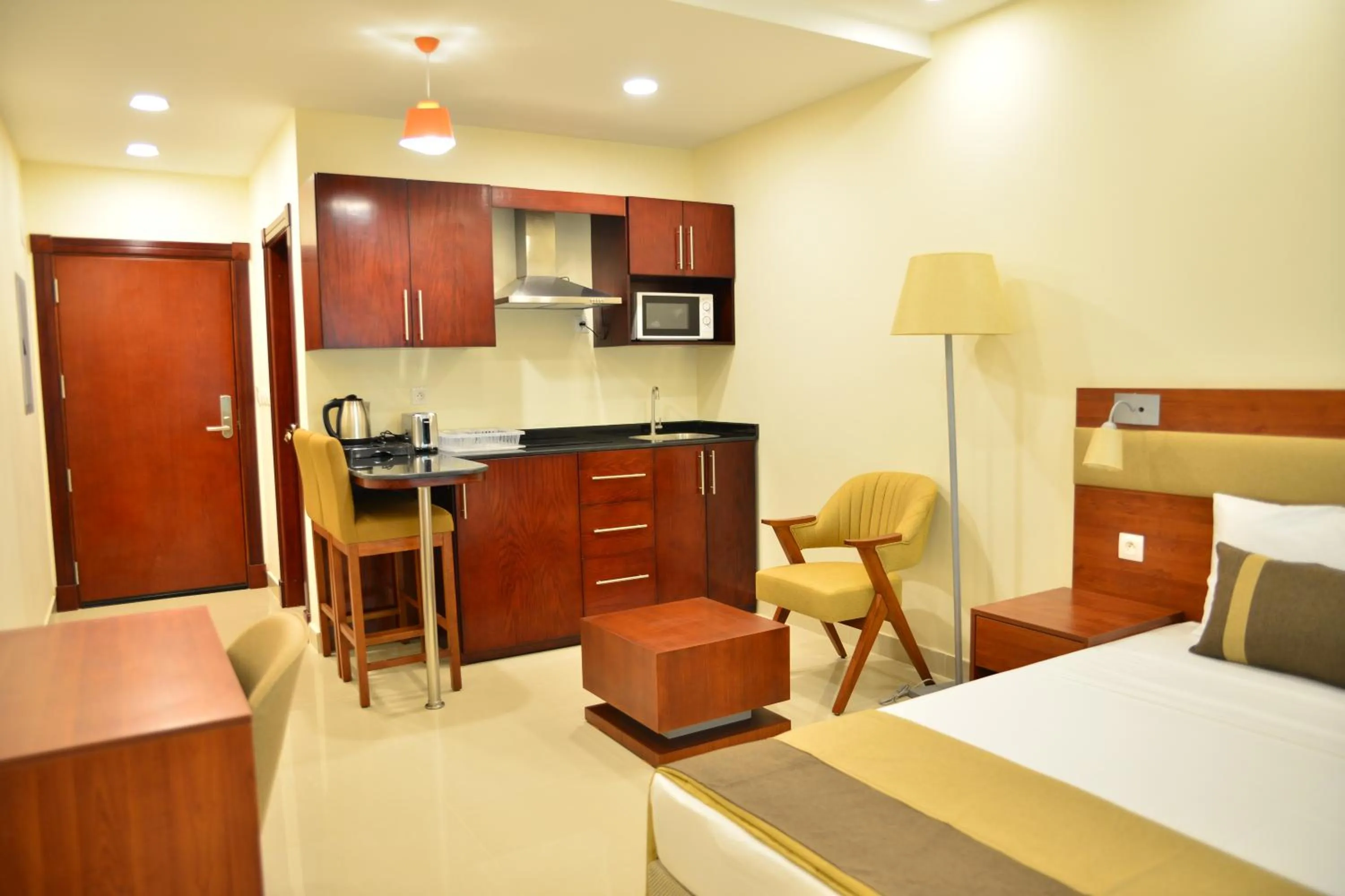 Kitchen or kitchenette, Bed in RED SEA HOTEL APARTMENT