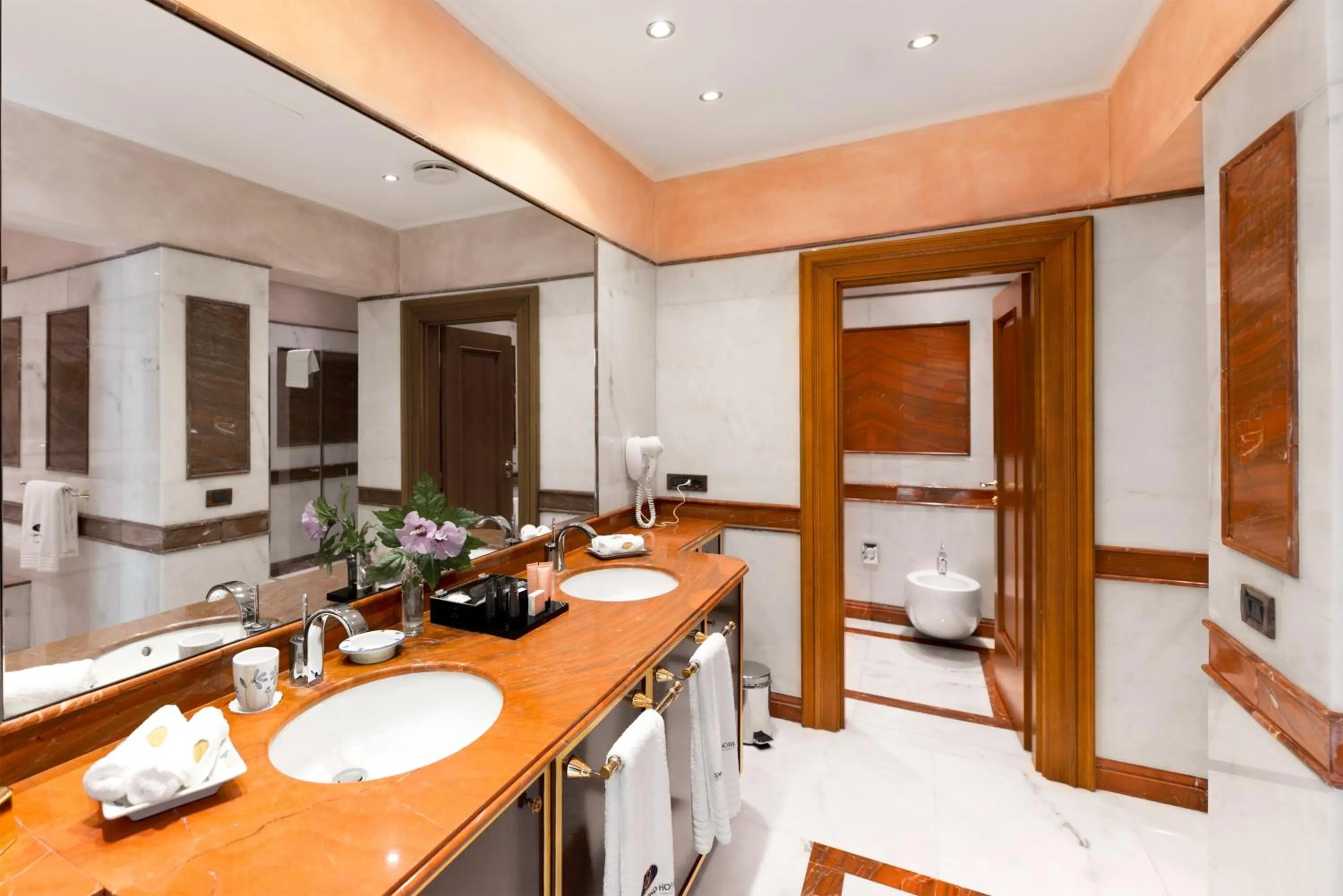 Bathroom, Bed in Swiss Diamond Hotel & Spa