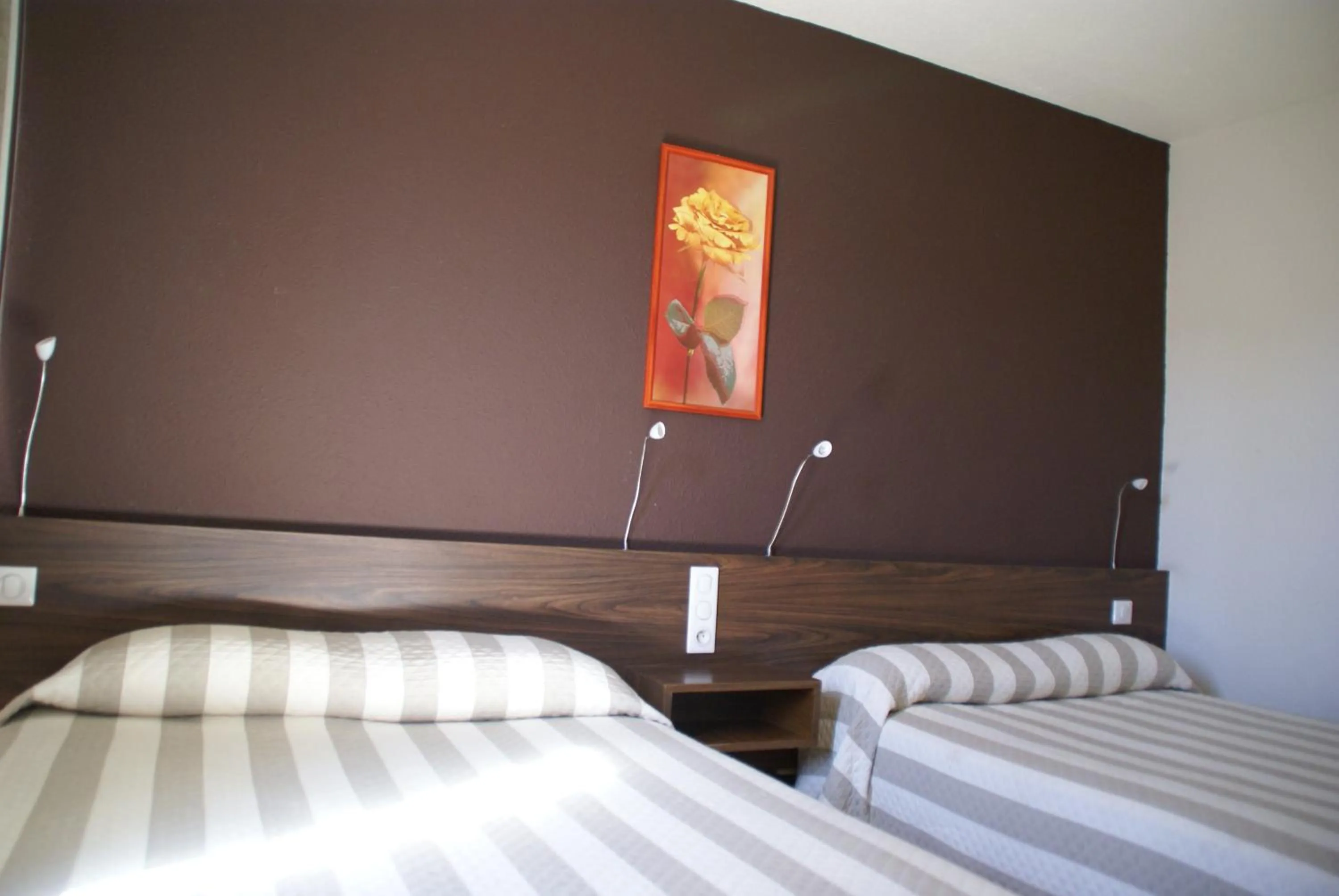 Bed in Hotel Le Lagon