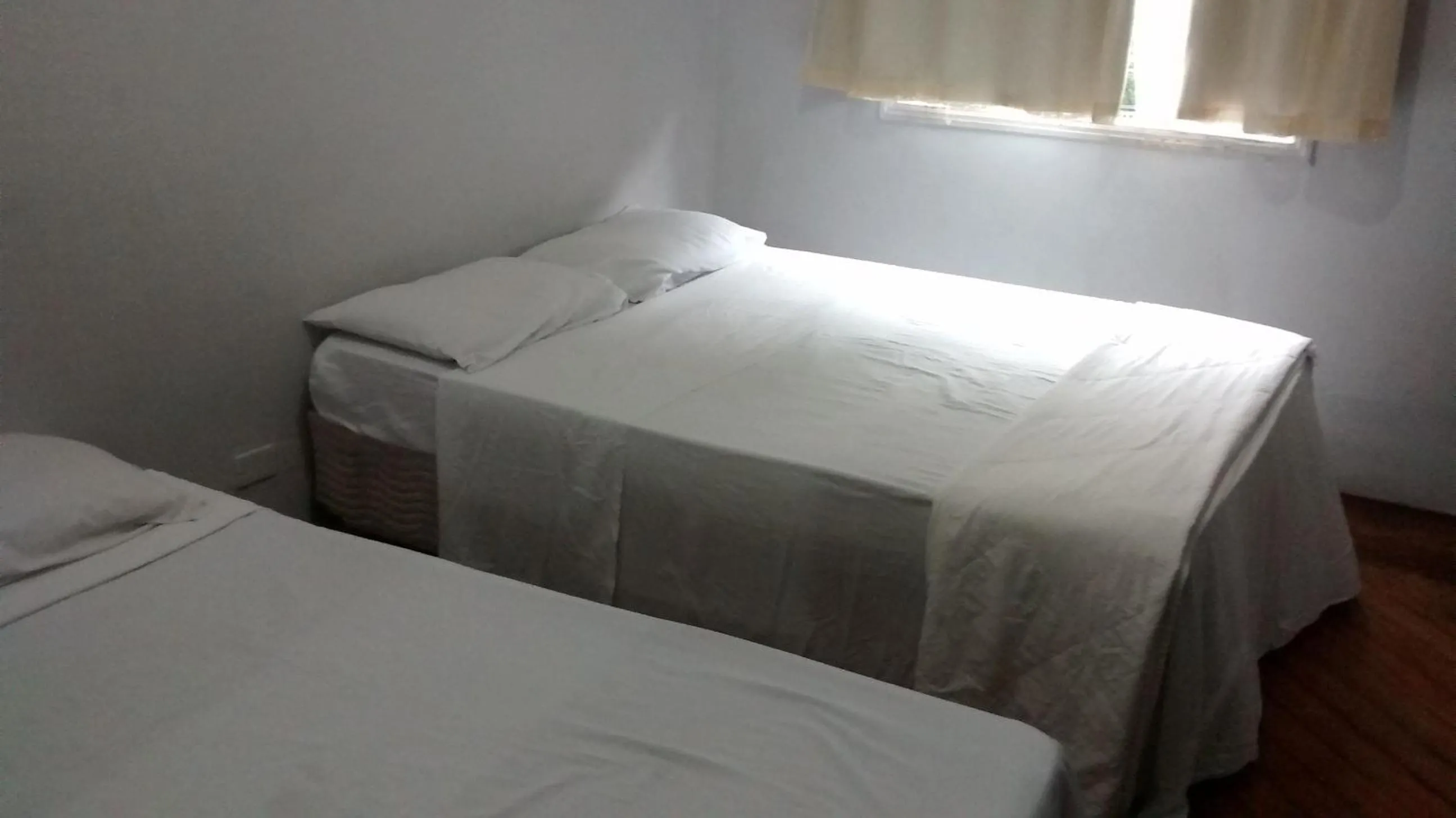 Bed in Pousada Vila Pitanga