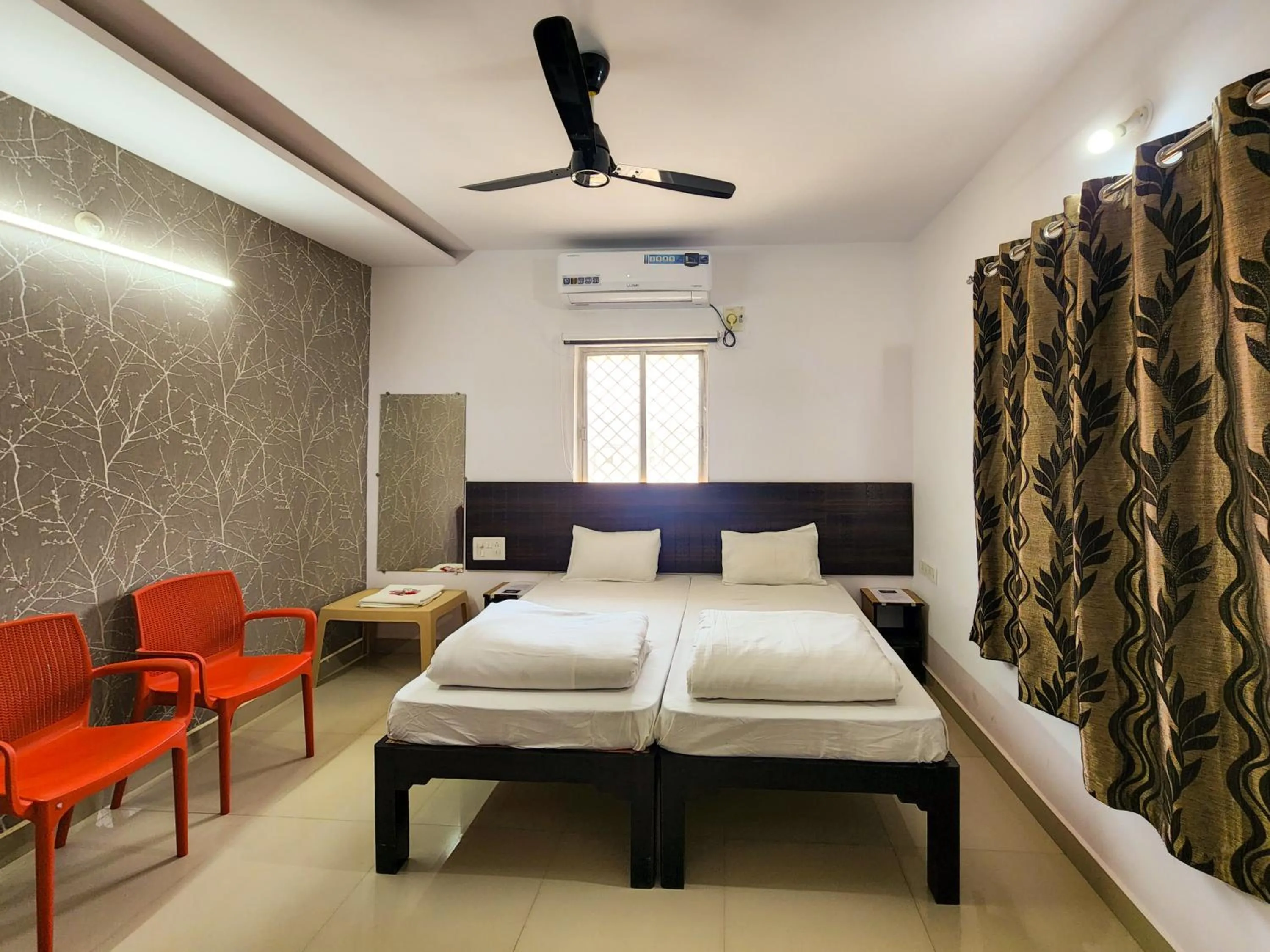 Bed in Shivani Inn Hotel & Banquet