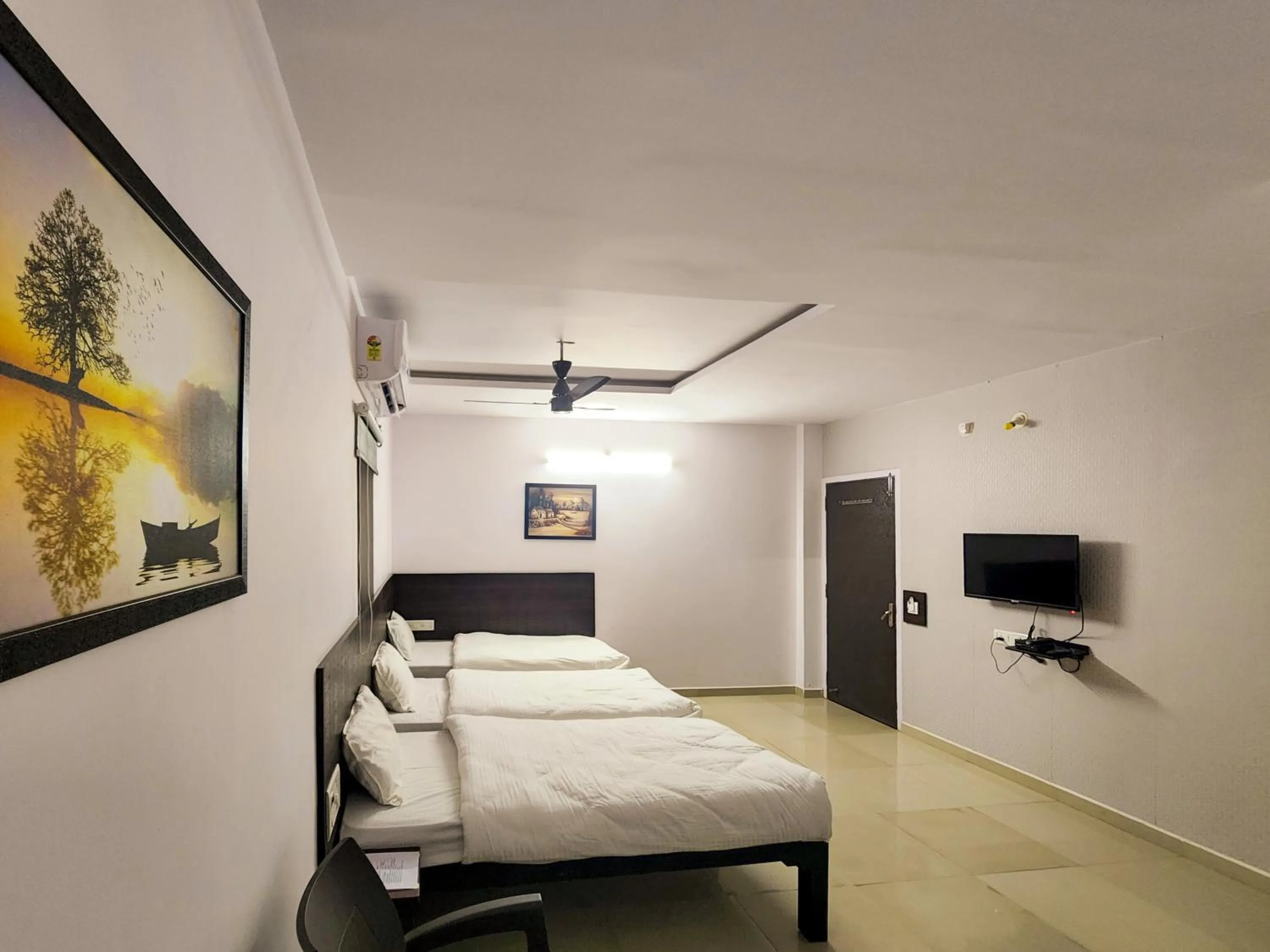 Bed in Shivani Inn Hotel & Banquet