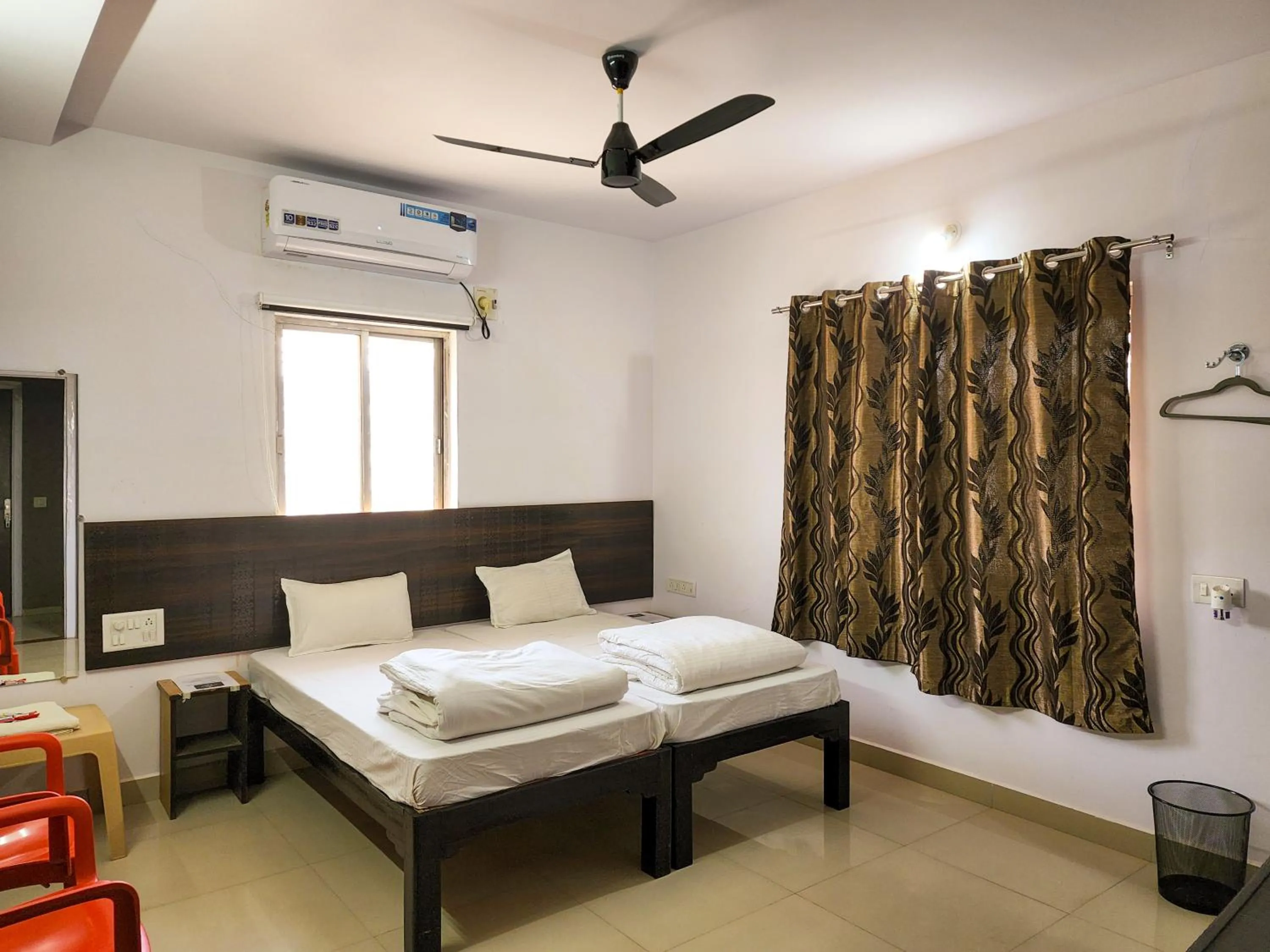 Bed in Shivani Inn Hotel & Banquet