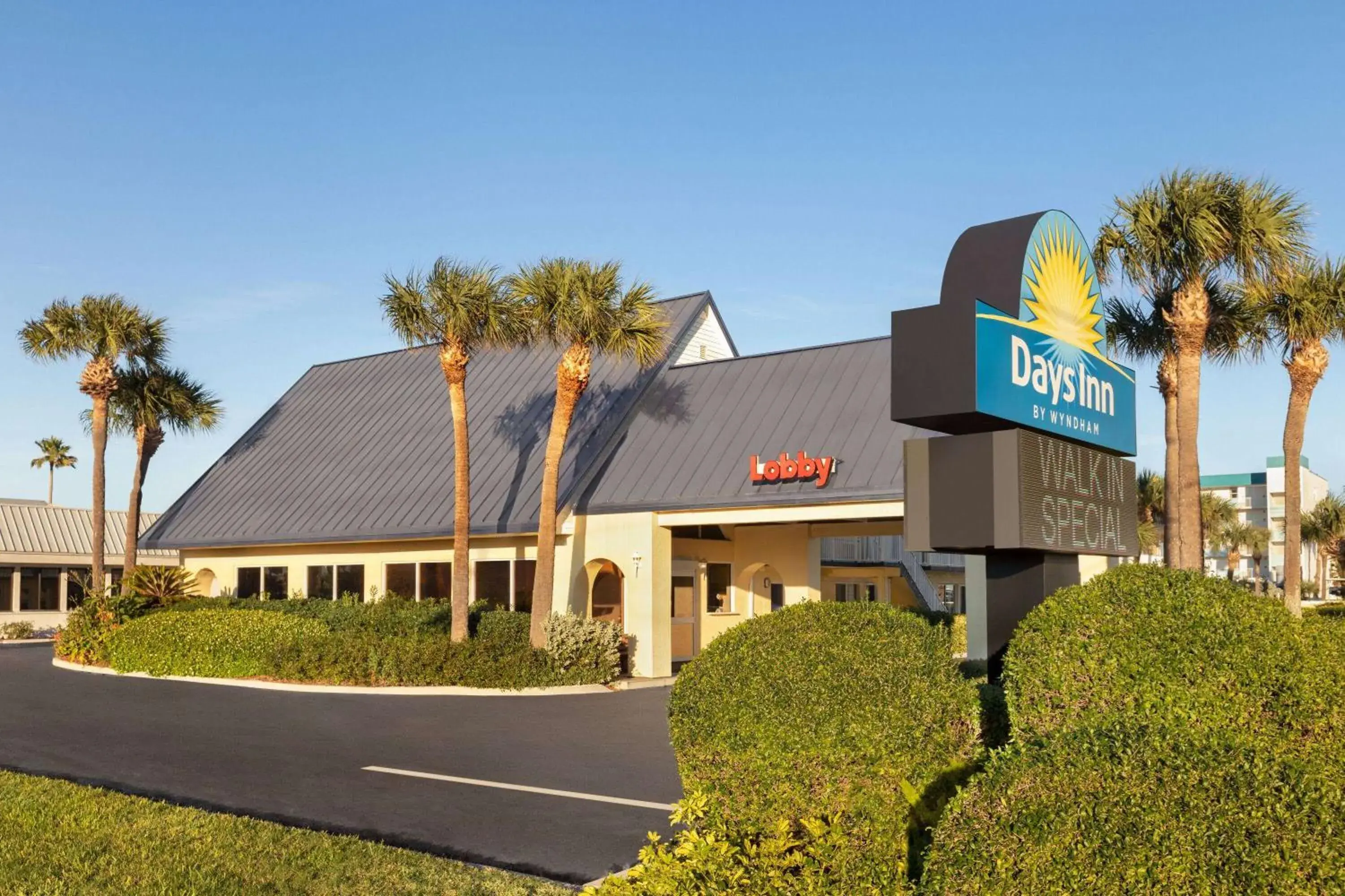 Property building in Days Inn by Wyndham Cocoa Beach Port Canaveral Property building in Days Inn by Wyndham Cocoa Beach Port Canaveral