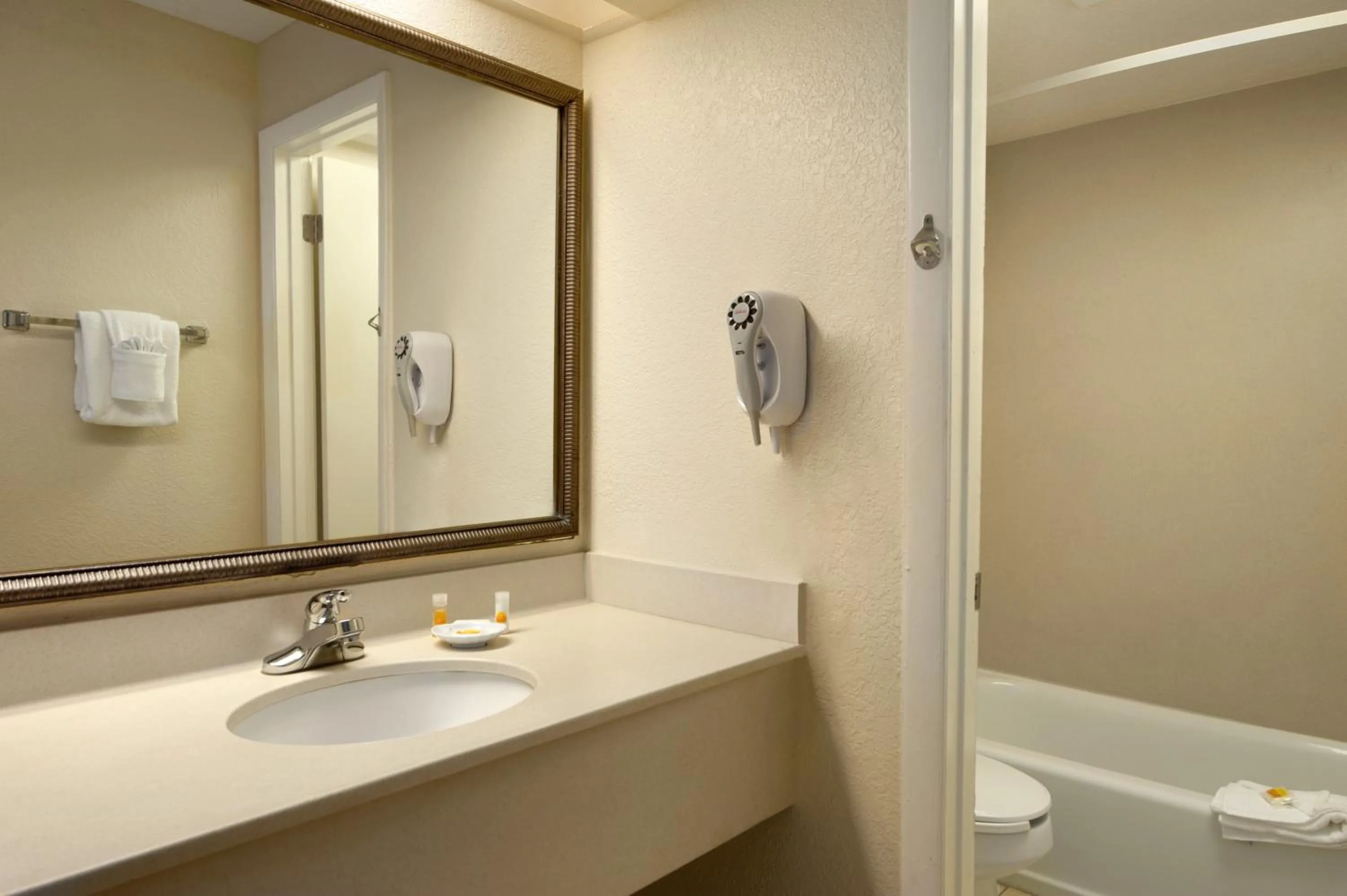 Bathroom in Days Inn by Wyndham Cocoa Beach Port Canaveral