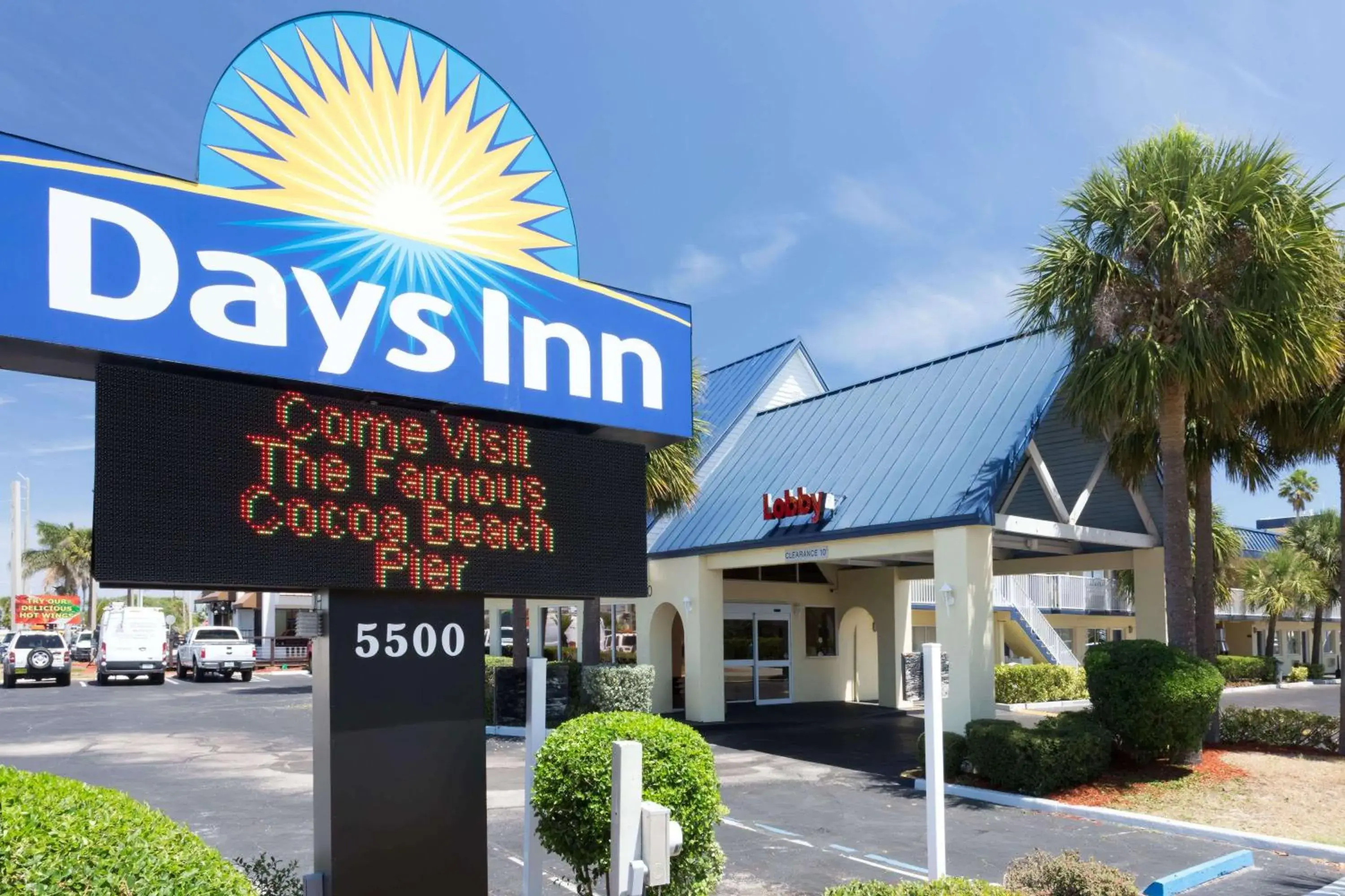 Property building in Days Inn by Wyndham Cocoa Beach Port Canaveral Property building in Days Inn by Wyndham Cocoa Beach Port Canaveral