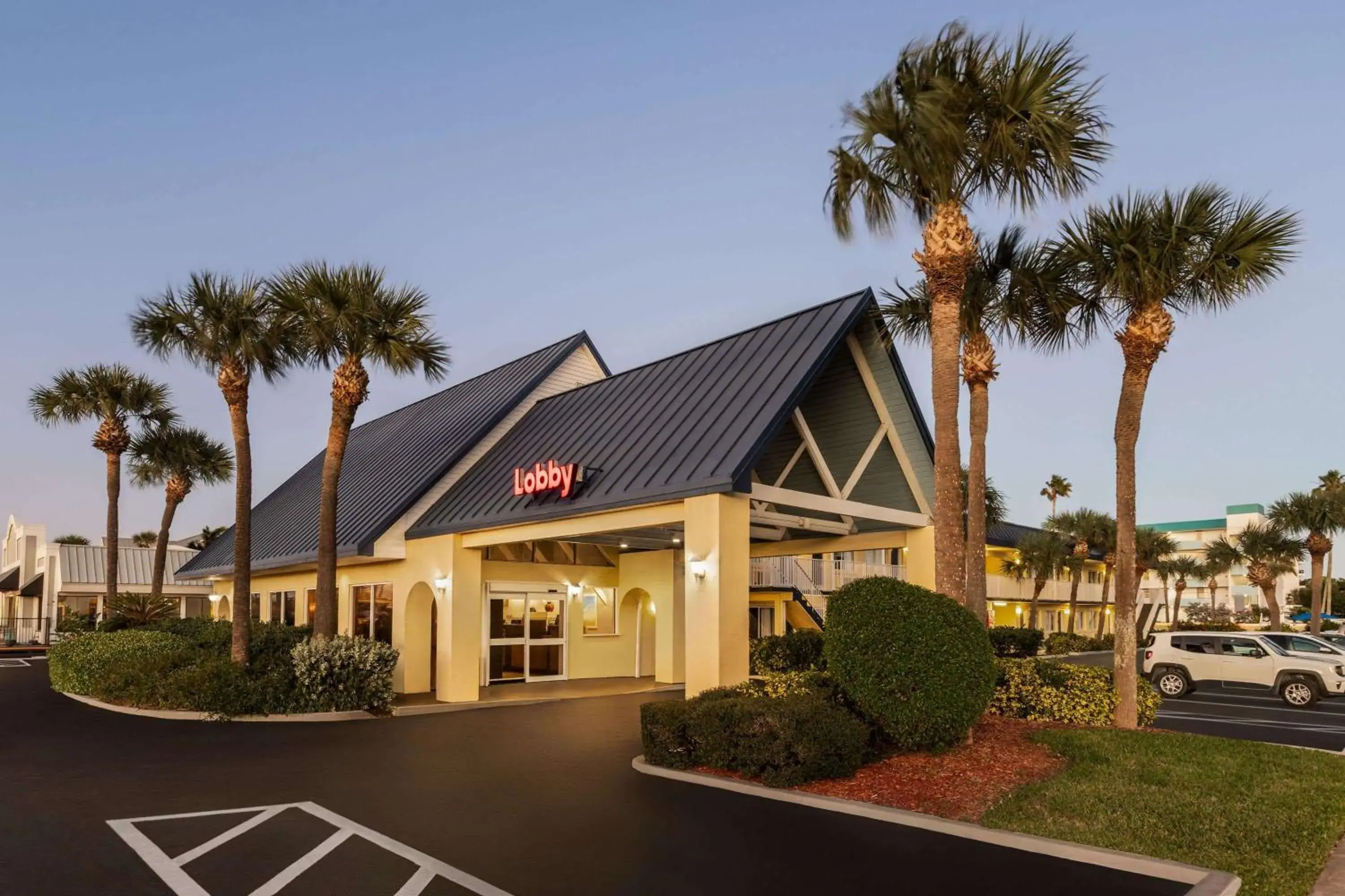 Property building in Days Inn by Wyndham Cocoa Beach Port Canaveral Property building in Days Inn by Wyndham Cocoa Beach Port Canaveral