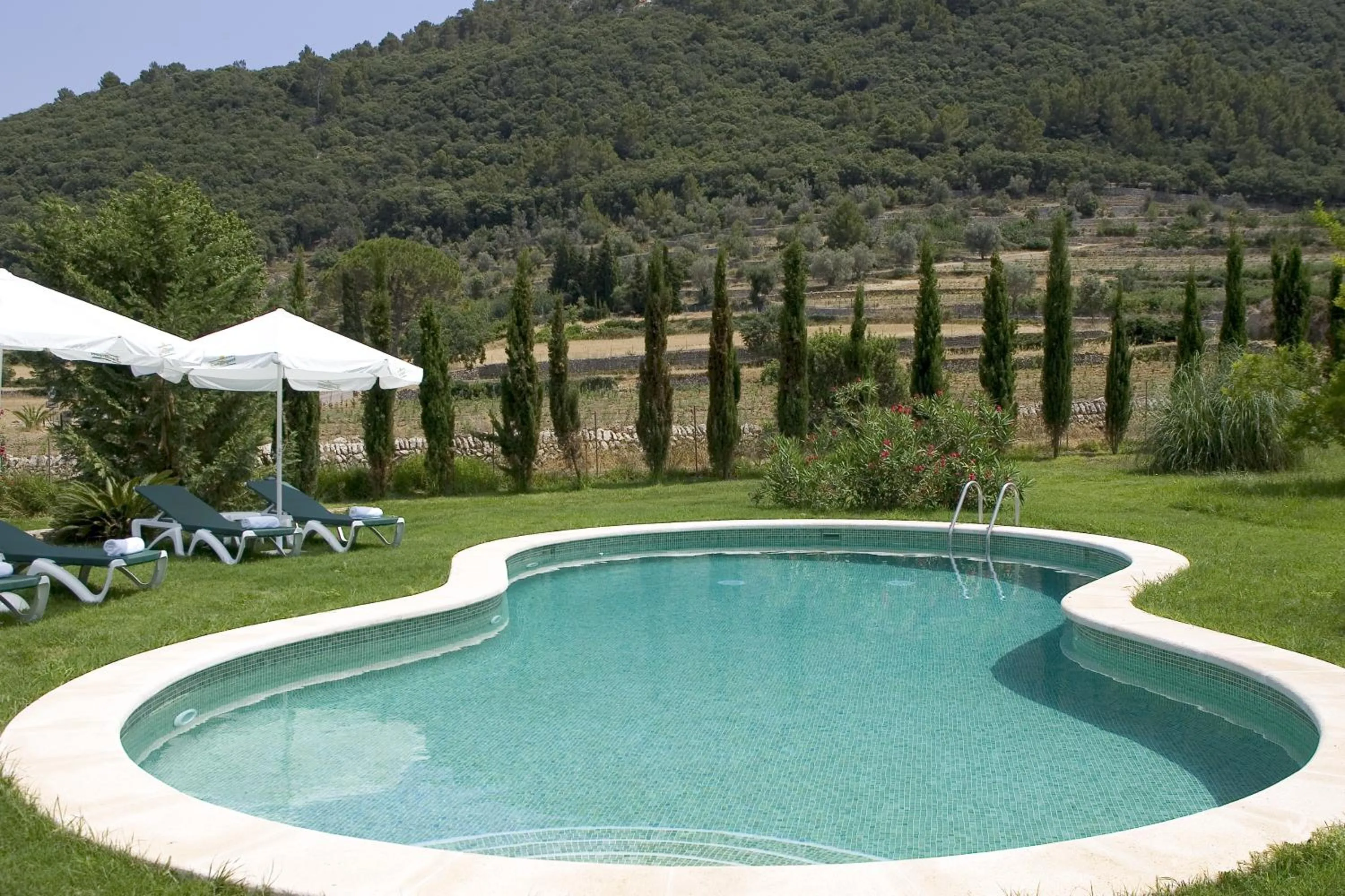 Pool view in Hotel Rural Nou Dalt Muntanya