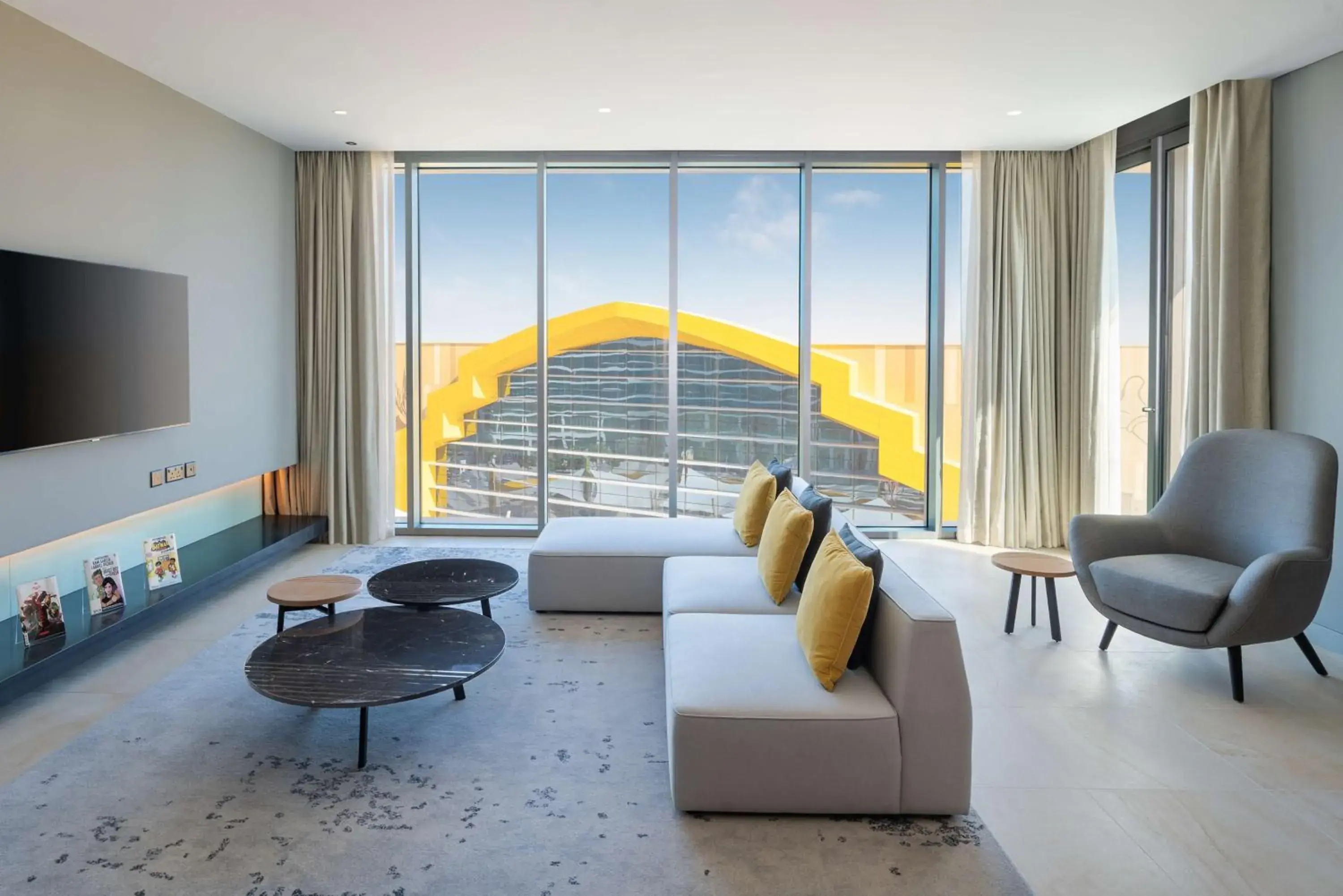 Living room in The WB Abu Dhabi, Curio Collection By Hilton Living room in The WB Abu Dhabi, Curio Collection By Hilton