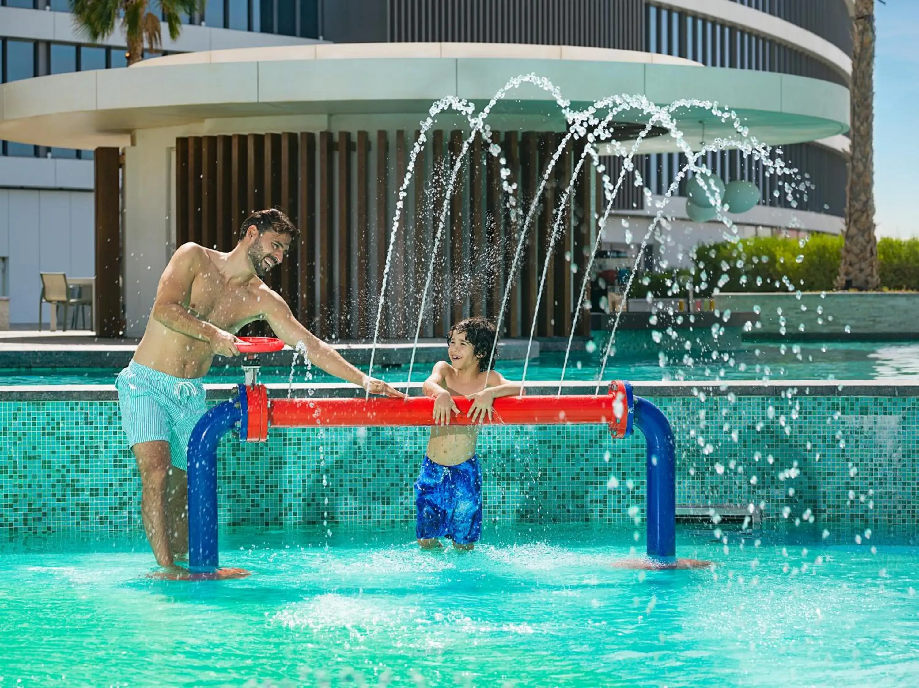 Swimming pool in The WB Abu Dhabi, Curio Collection By Hilton Swimming pool in The WB Abu Dhabi, Curio Collection By Hilton