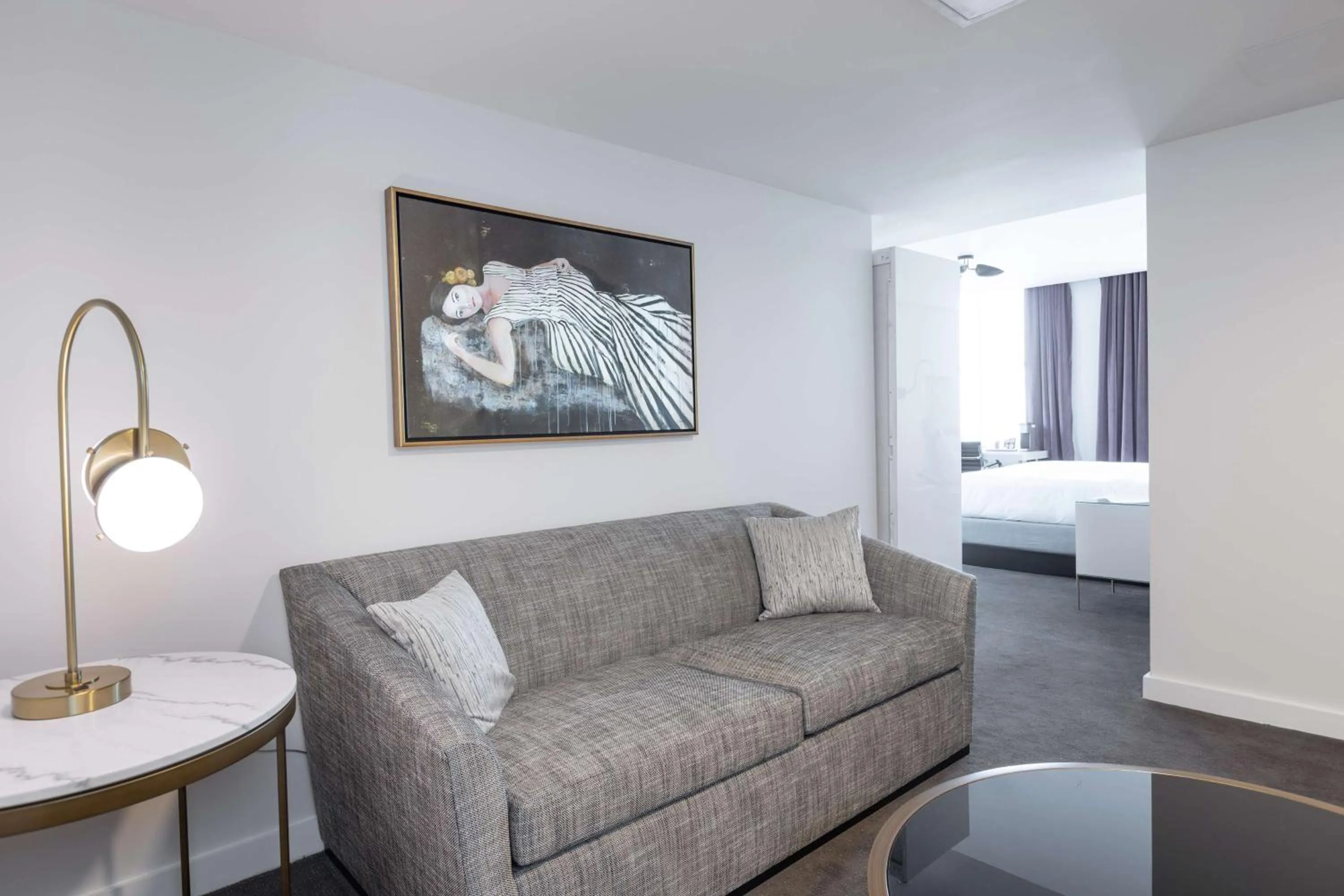 Living room in The Kelly Birmingham, Tapestry Collection By Hilton