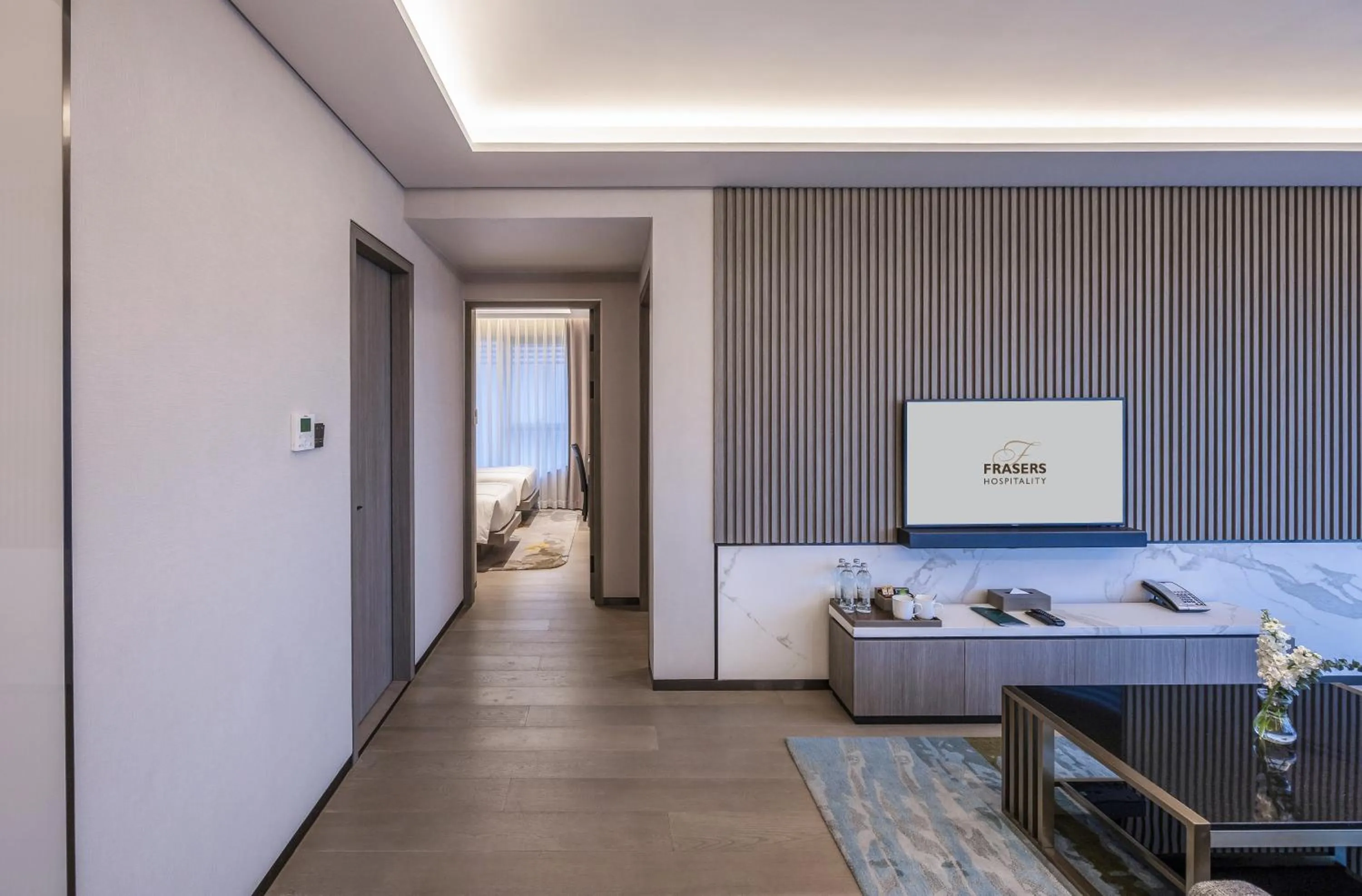 Living room, Bed in Fraser Residence Hanoi