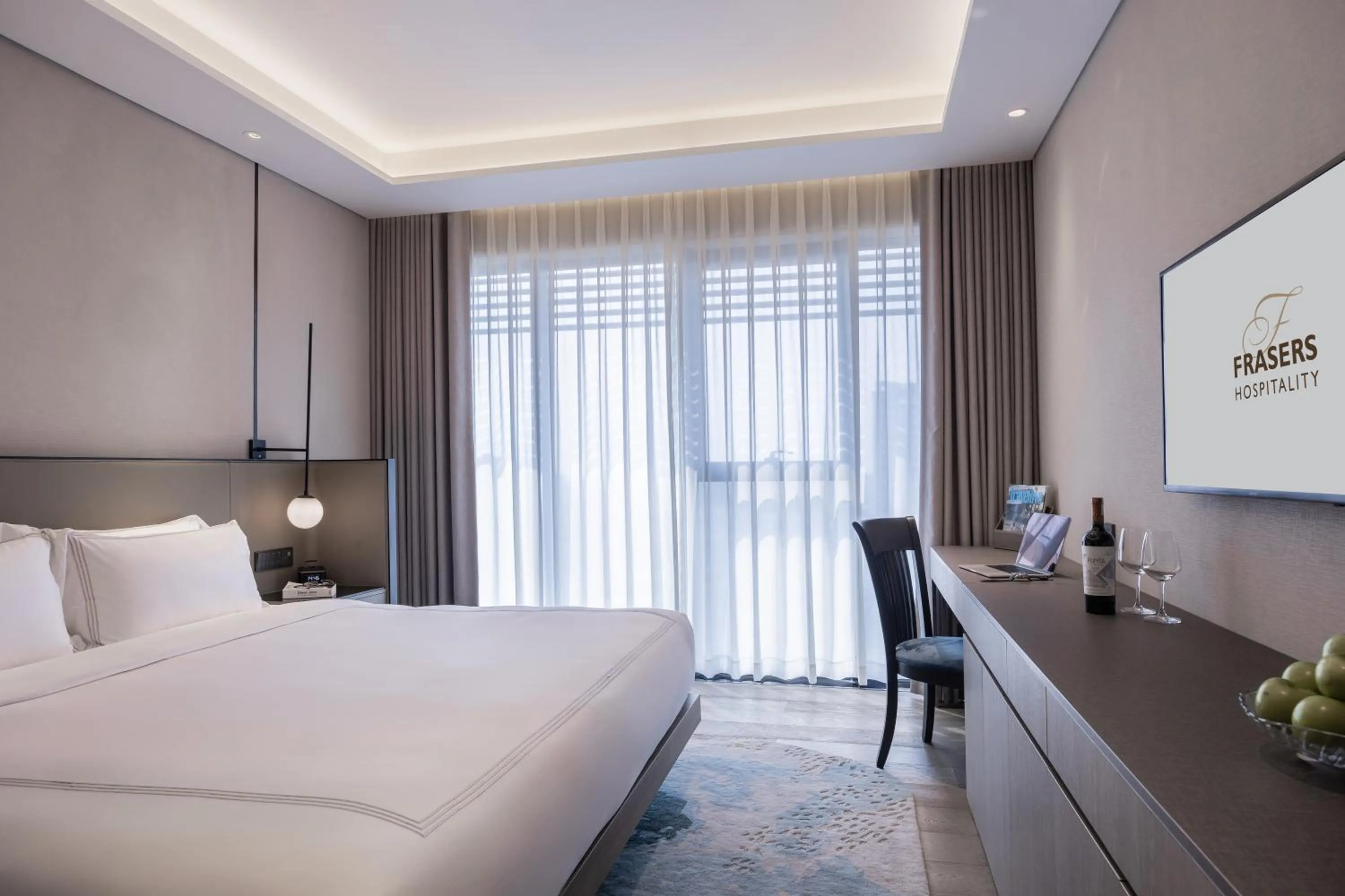 Bed in Fraser Residence Hanoi