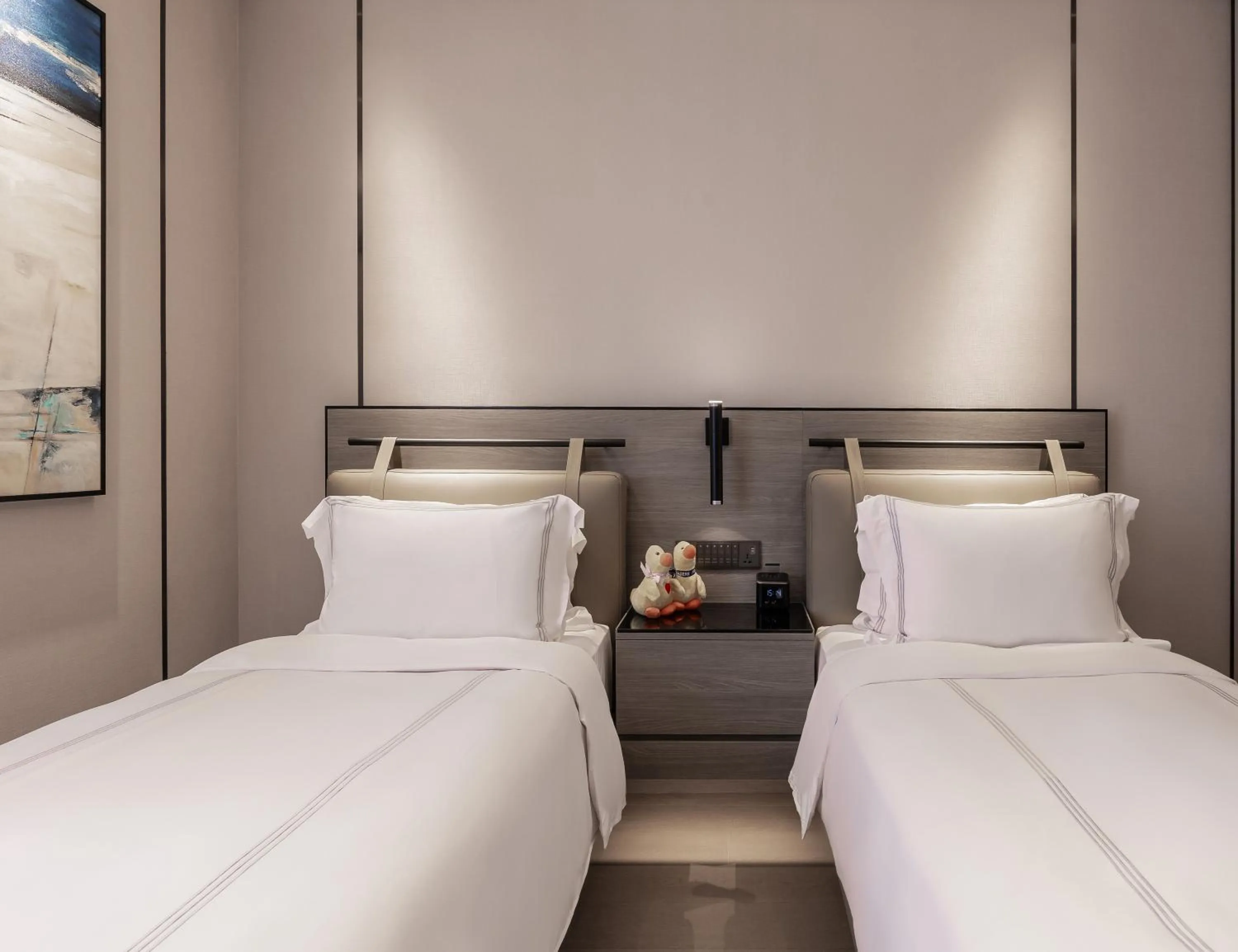 Bed in Fraser Residence Hanoi