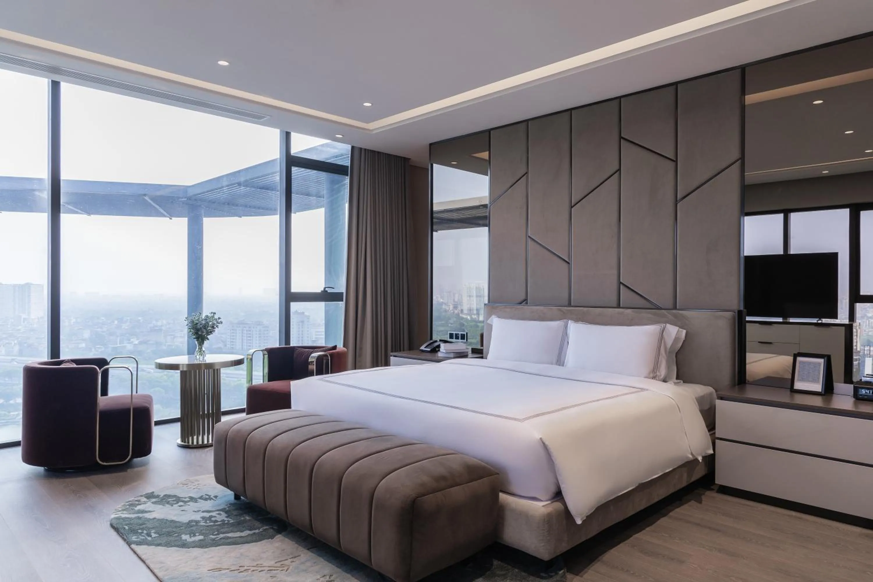 Bed in Fraser Residence Hanoi