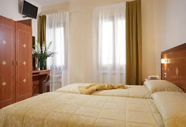 Bed in Hotel Adriatico